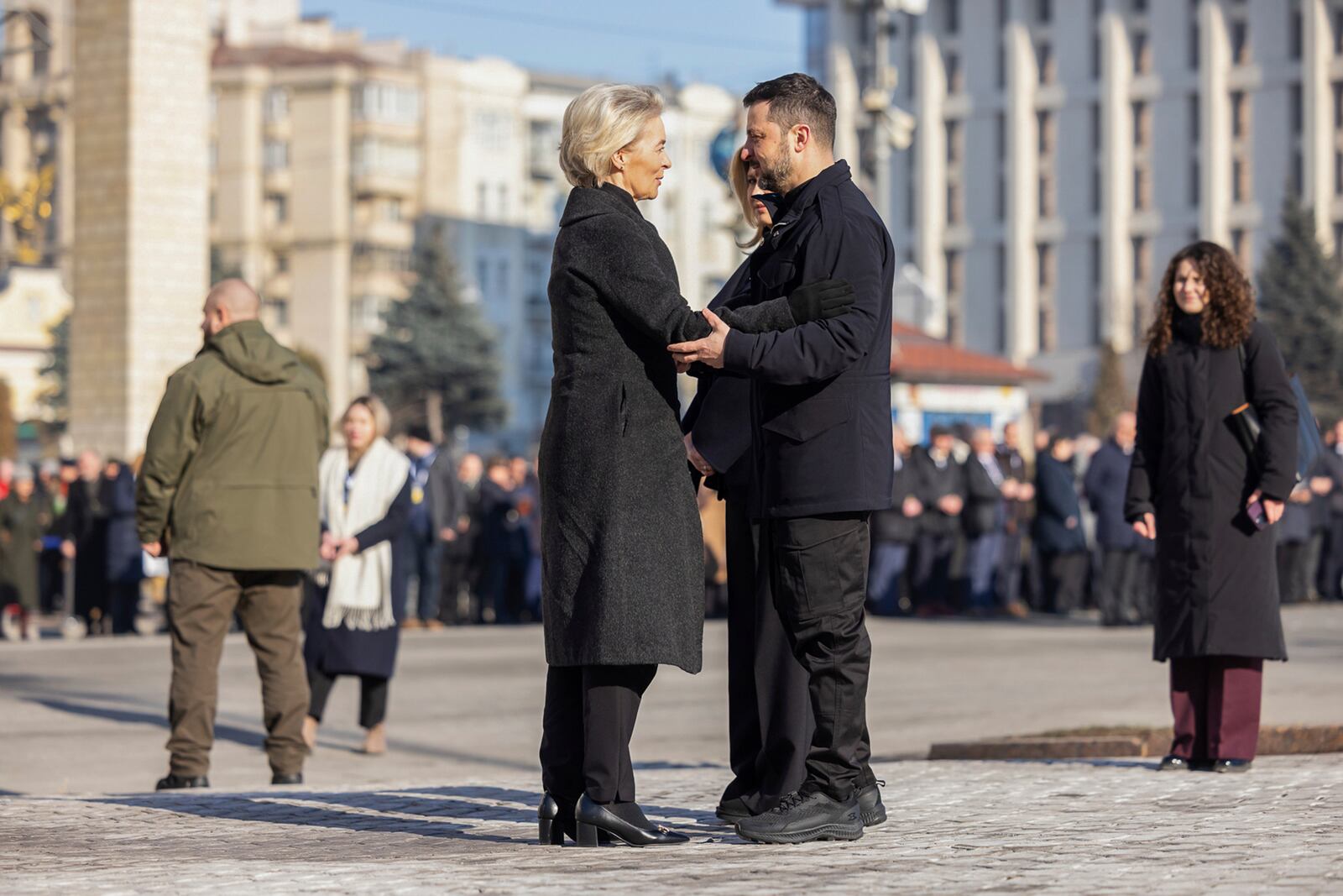 In this photo provided by the Ukrainian Presidential Press Office, Office Ukraine's President Volodymyr Zelensky, right, greeting European Commission President Ursula von der Leyen during a ceremony in Kyiv, Ukraine, Monday, Feb. 24, 2025. (Ukrainian Presidential Press Office via AP)