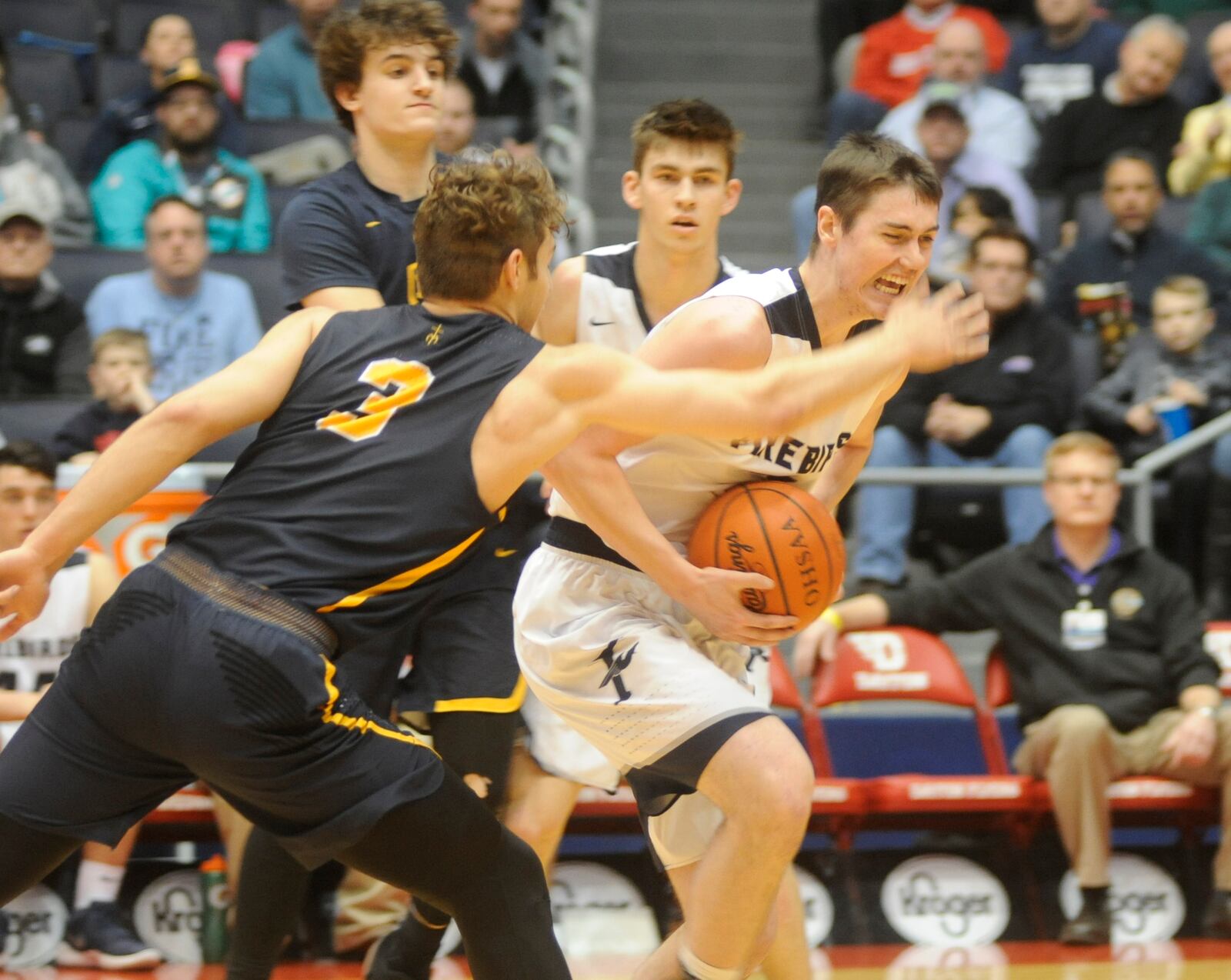 Cade Morgan of Fairmont (with ball) works against Carlos Garcia of Moeller. MARC PENDLETON / STAFF