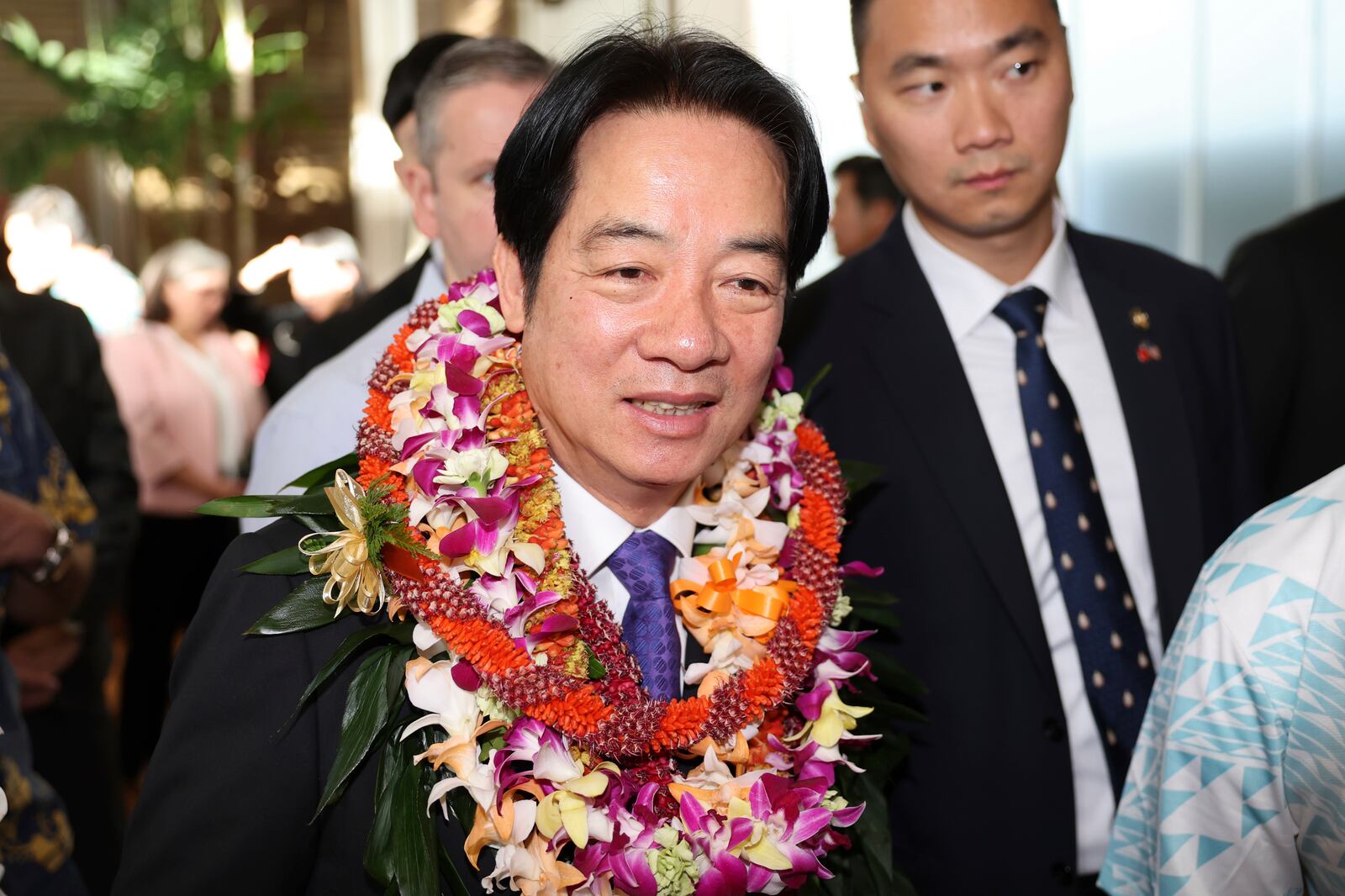 Taiwan President Lai Ching-te greets people at the Kahala Hotel and Resort Saturday, Nov. 30, 2024 in Honolulu. (AP Photo/Marco Garcia)