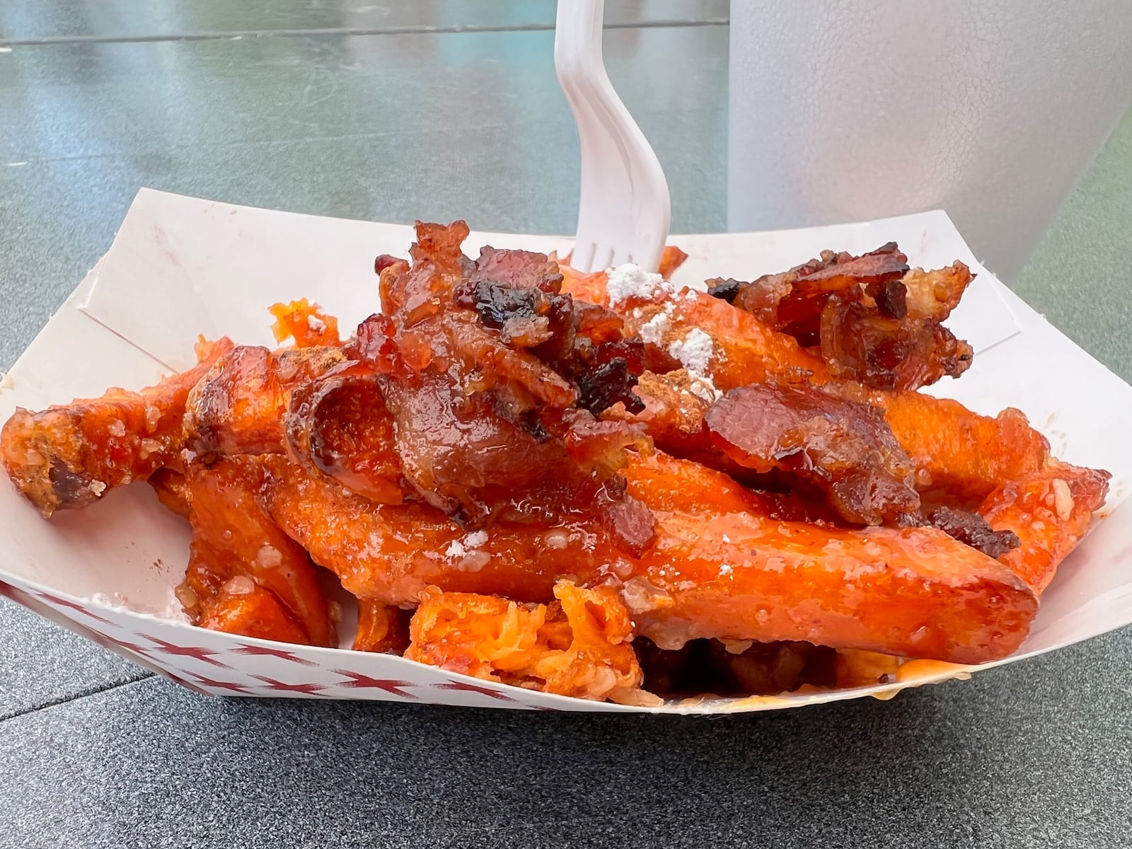 Bacon Fest 2022 bacon and parm sweet potato fries from Rolling Indulgence was awarded Best Dish by critics. ALEXIS LARSEN/CONTRIBUTED