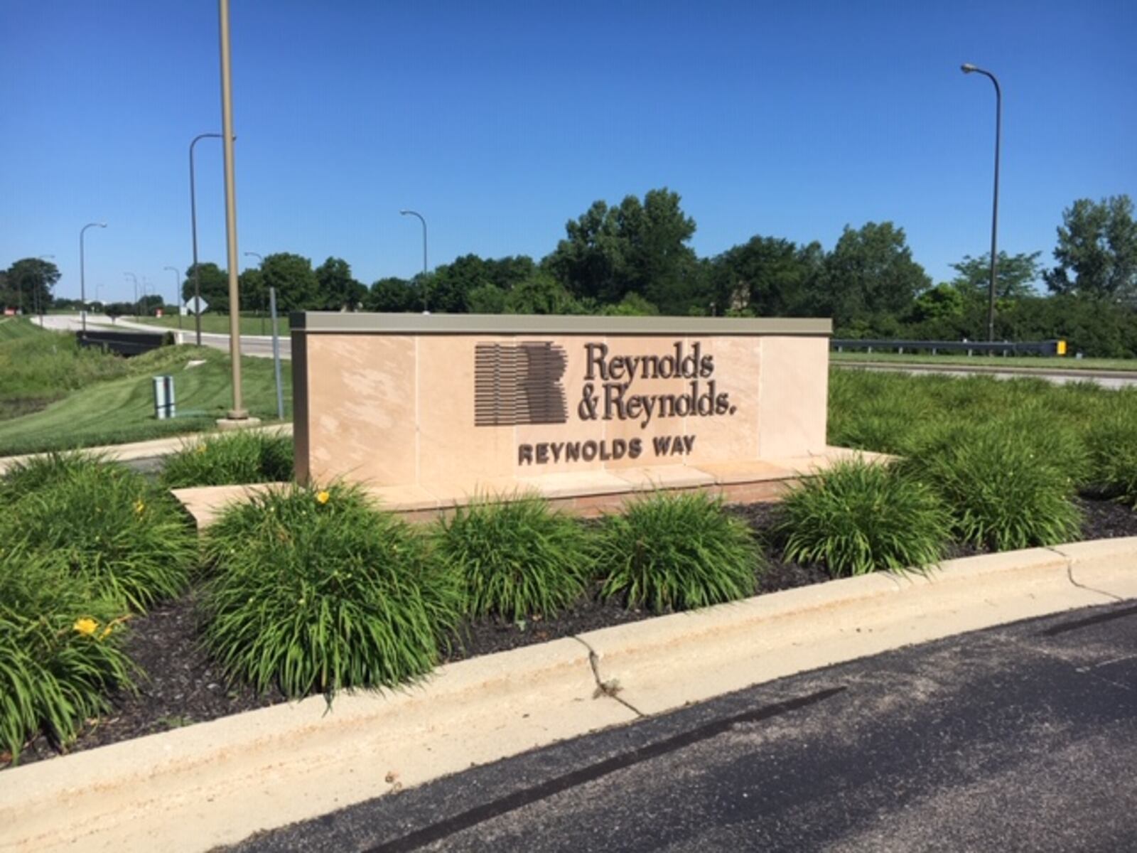 An entrance to the Reynolds and Reynolds campus off Research Boulevard in Kettering. THOMAS GNAU/STAFF