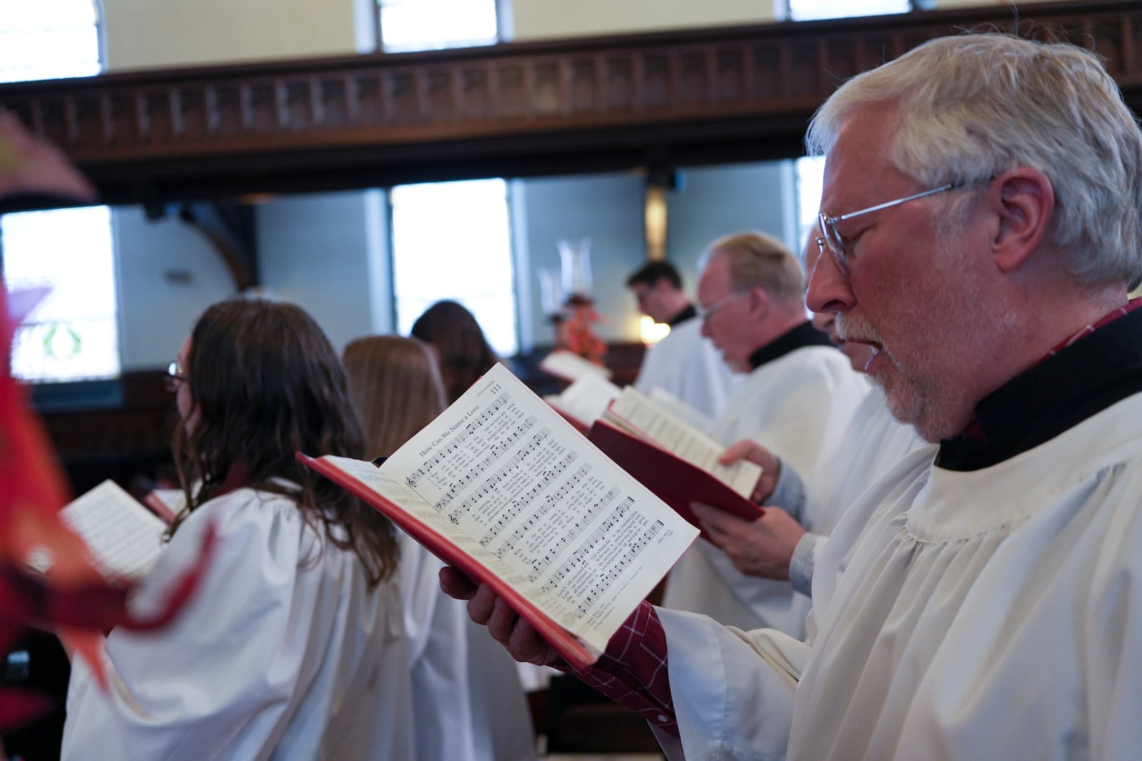 Members of Grace United Methodist Church's choir sing hymns during a service in Harrisburg, Pa., on Sunday, Oct. 27, 2024. (AP Photo/Luis Andres Henao)