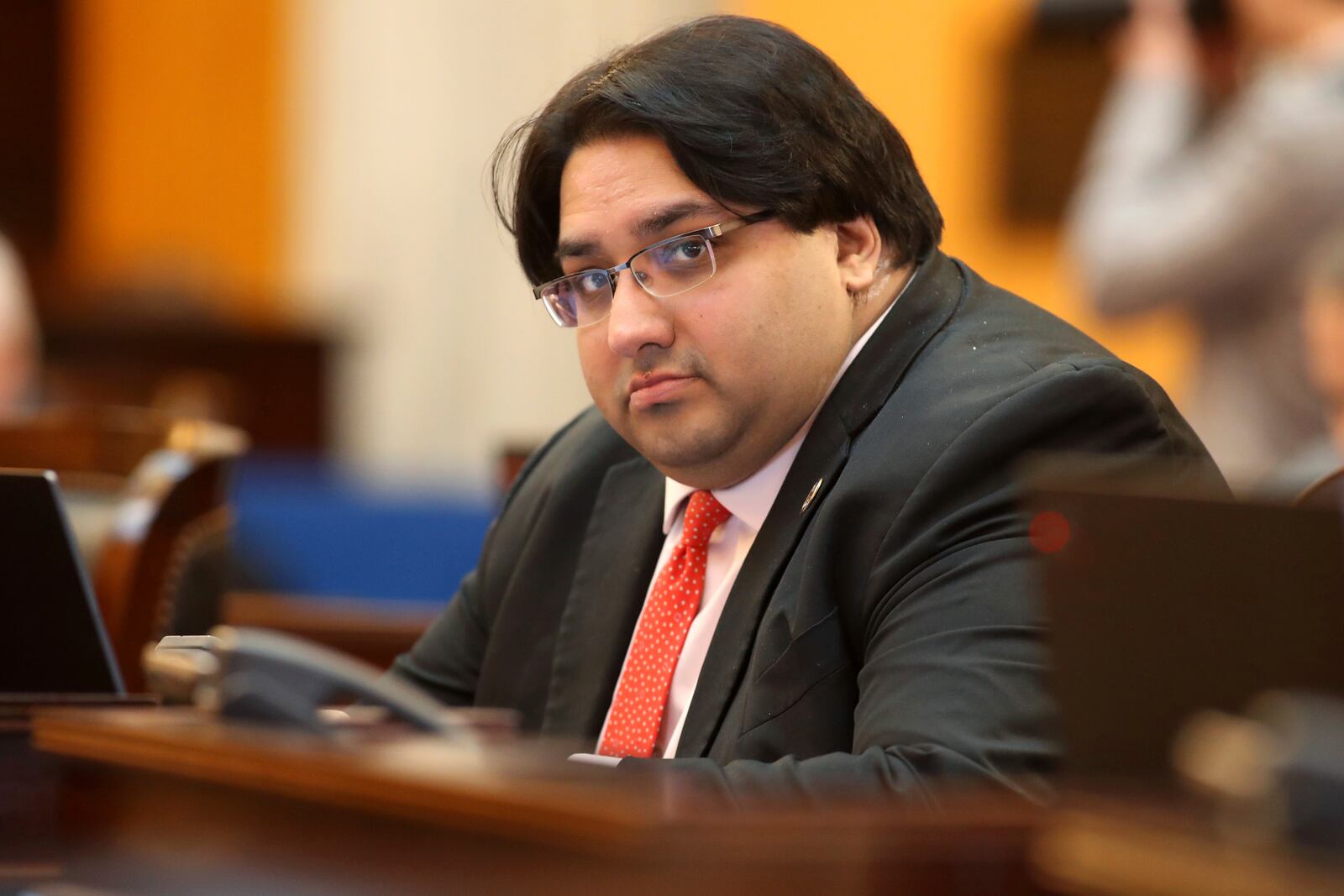 FILE - State Sen. Niraj Antani, R-6th District, listens during a debate in the Senate Chambers in Columbus, Ohio, Wednesday, Feb. 28, 2024. Antani is one of 11 candidates vying for the Republican nomination for a seat in Ohio’s 2nd Congressional District, which extends from suburban Cincinnati to the West Virginia border. The winner of the primary will face Democrat Samantha Meadows in the November general election. (AP Photo/Joe Maiorana, File)