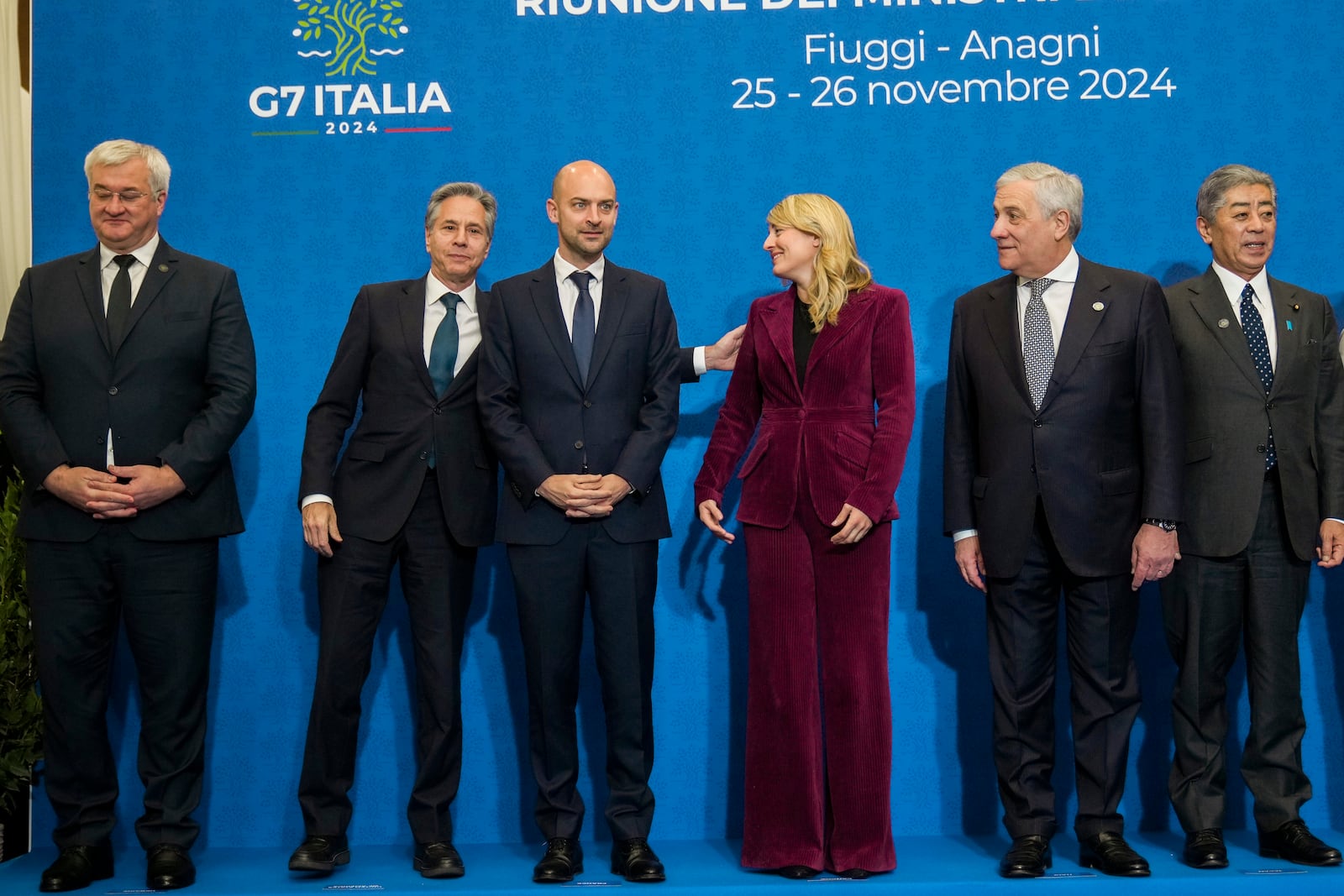 From left, Ukrainian Foreign Minister Andrii Sybiha, U.S. Secretary of State Antony Blinken, French Foreign Minister Jean-Noël Barrot, Canada's Foreign Minister Melanie Joly, Italian Foreign Minister Antonio Tajani, and Japanese Foreign Minister Takeshi Iwaya prepare for a family photo at the G7 of foreign Ministers in Fiuggi, some 70 kilometers south-east of Rome, Tuesday, Nov. 26, 2024. (AP Photo/Alessandra Tarantino, Pool)