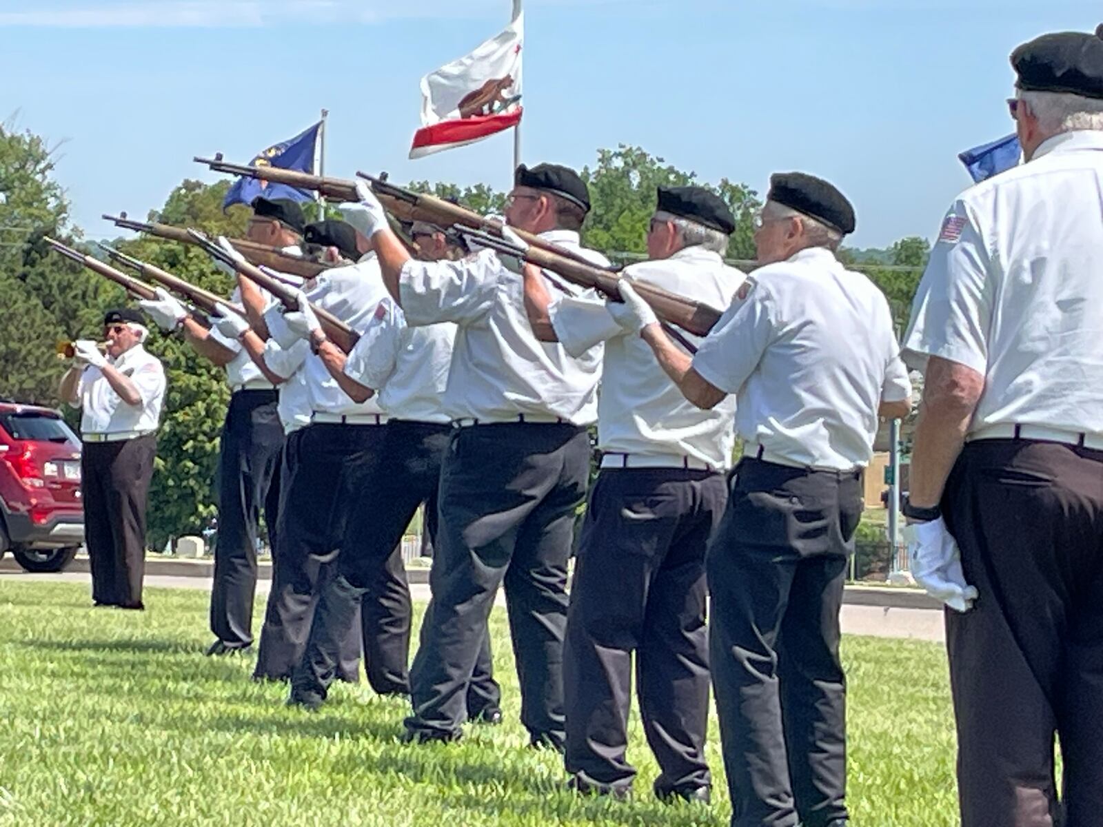 Dayton National Cemetery Honor Squad performed a rifle salute during Memorial Day ceremonies Monday at the Dayton National Cemetery. NICK BLIZZARD/STAFF