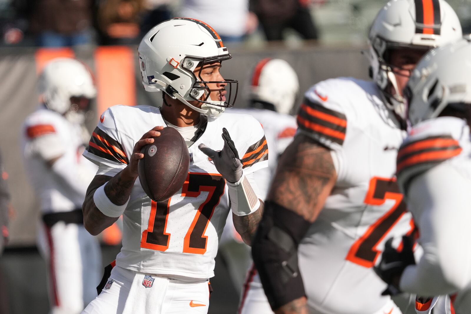 Cleveland Browns quarterback Dorian Thompson-Robinson (17) warms up before an NFL football game against the Cincinnati Bengals, Sunday, Dec. 22, 2024, in Cincinnati. (AP Photo/Joshua A. Bickel)