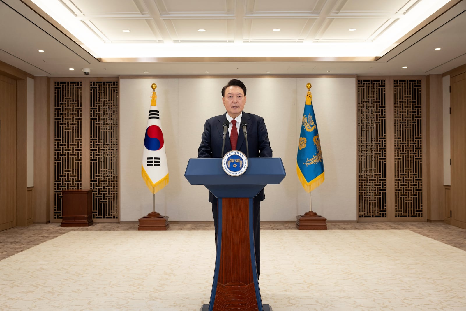 In this photo provided by South Korea Presidential Office, South Korean President Yoon Suk Yeol speaks at the presidential office in Seoul, South Korea, Thursday, Dec. 12, 2024. (South Korea Presidential Office via AP)