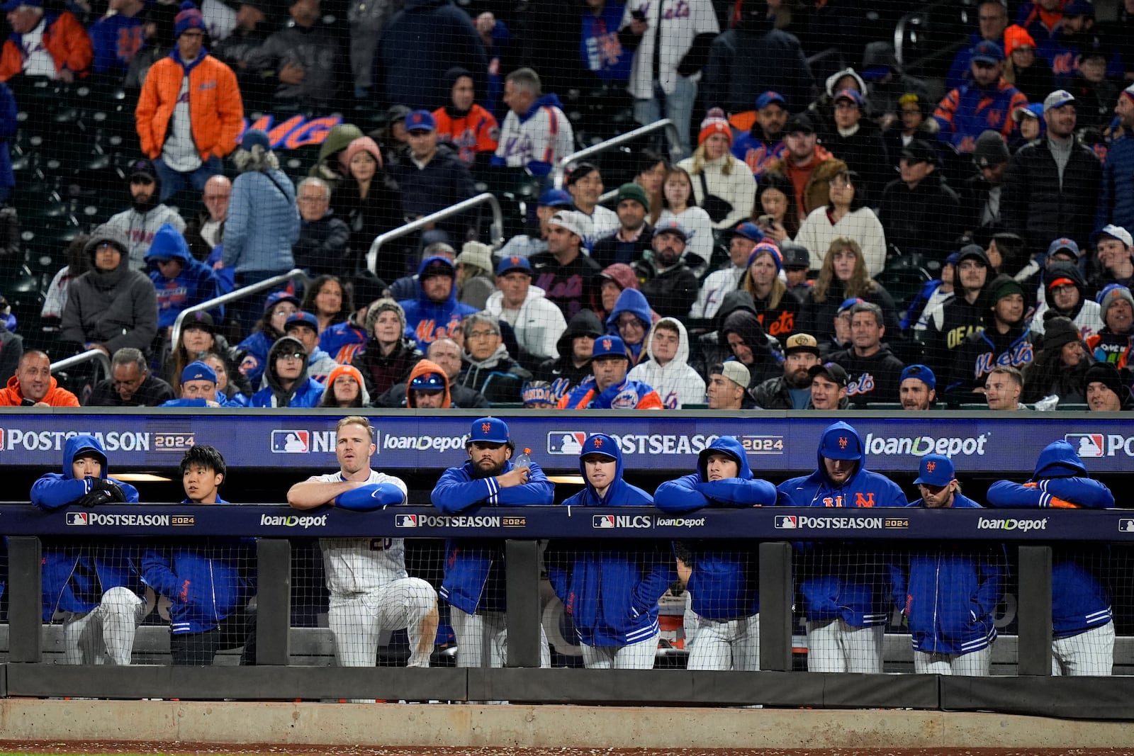 New York Mets watch during the ninth inning in Game 4 of a baseball NL Championship Series against the Los Angeles Dodgers, Thursday, Oct. 17, 2024, in New York. (AP Photo/Frank Franklin II)