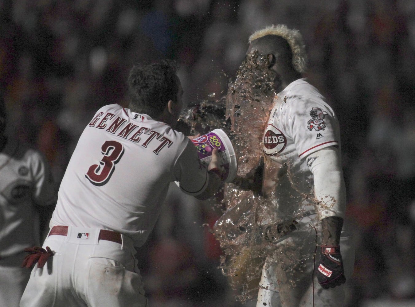 Photos: Reds beat Brewers on wild play in 11th