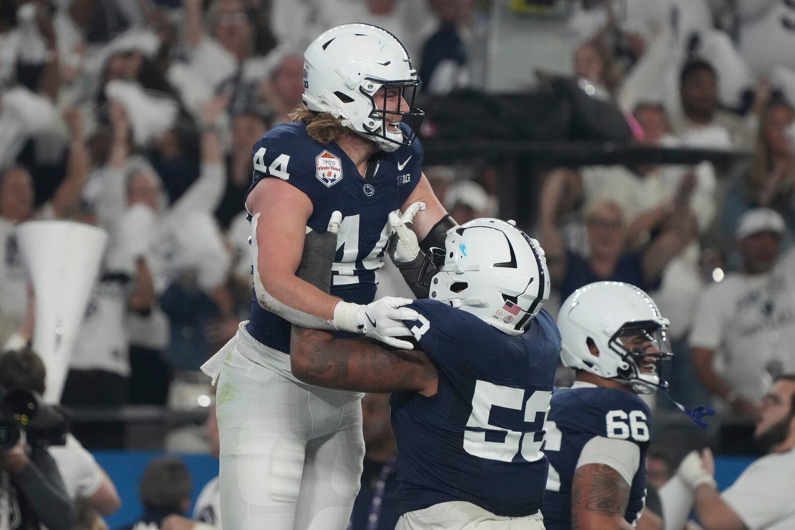 Penn State tight end Tyler Warren (44) celebrates his touchdown against Boise State during the Fiesta Bowl College Football Playoff game, Tuesday, Dec. 31, 2024, in Glendale, Ariz. (AP Photo/Rick Scuteri)