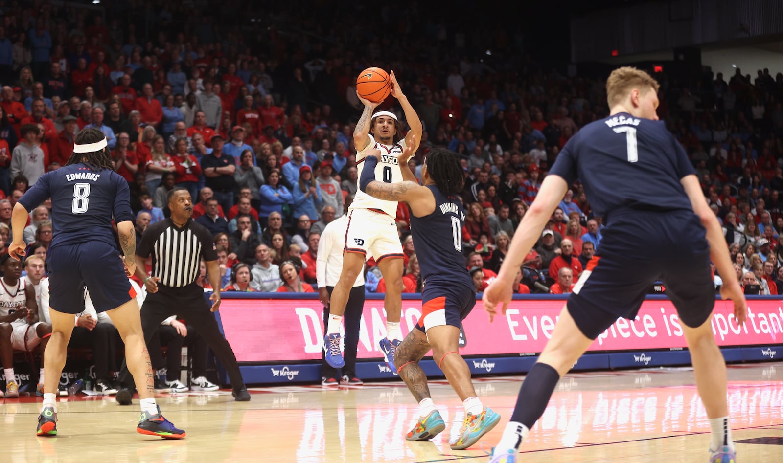 Dayton's Javon Bennett makes a jump shot in the final minutes of the second half against Duquesne on Saturday, Feb. 15, 2025, at UD Arena.. David Jablonski/Staff