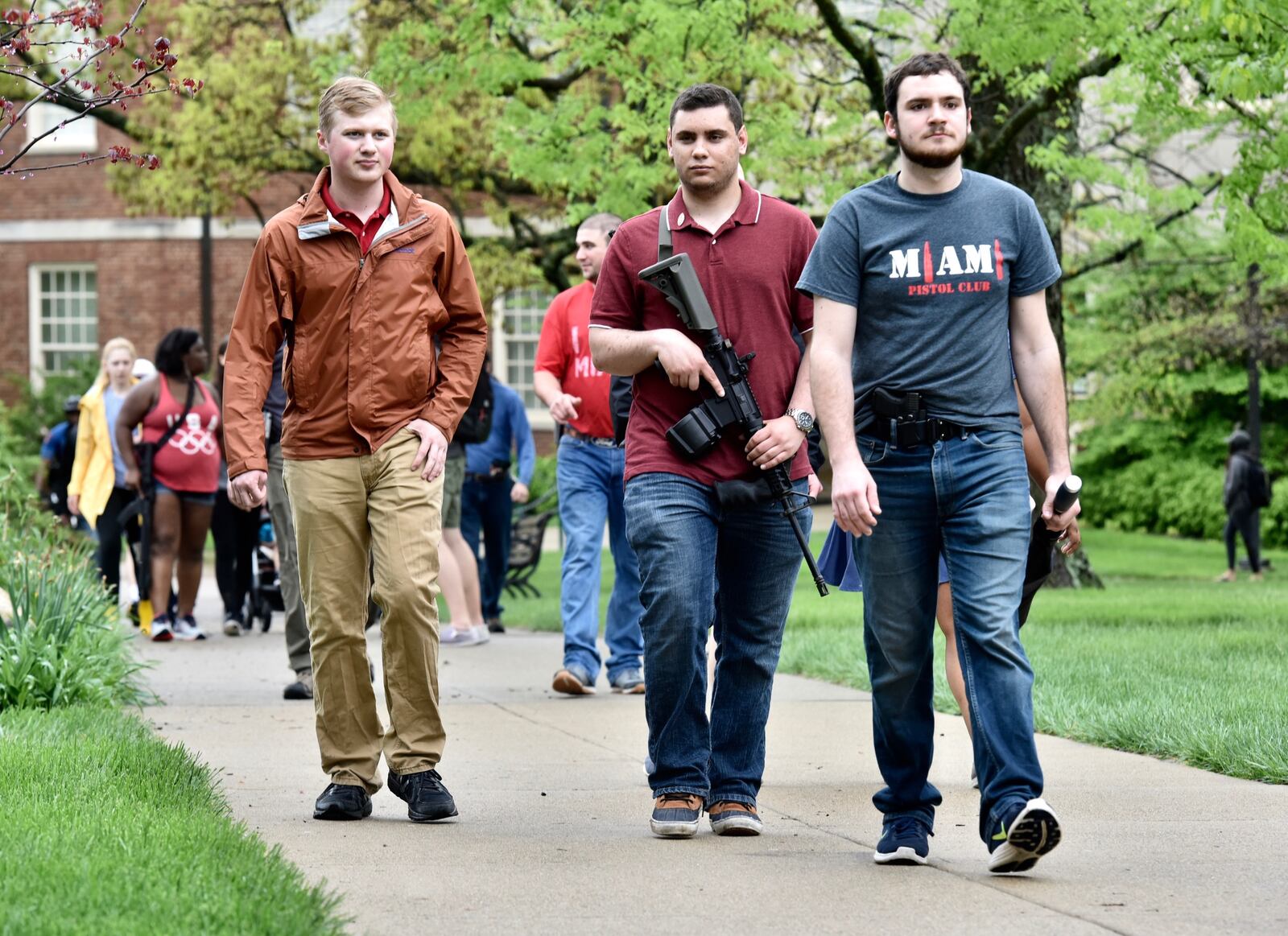 A parade through Miami University on Friday, May 3, 2019 supported open carry. NICK GRAHAM / STAFF