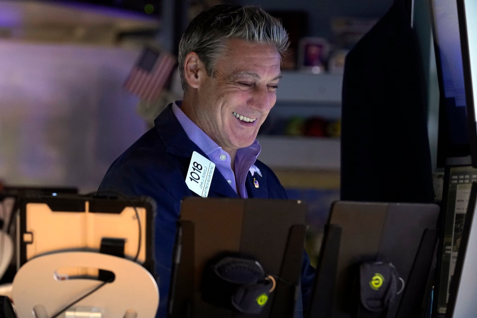 Trader John Romolo works on the floor of the New York Stock Exchange, Wednesday, March 12, 2025. (AP Photo/Richard Drew)