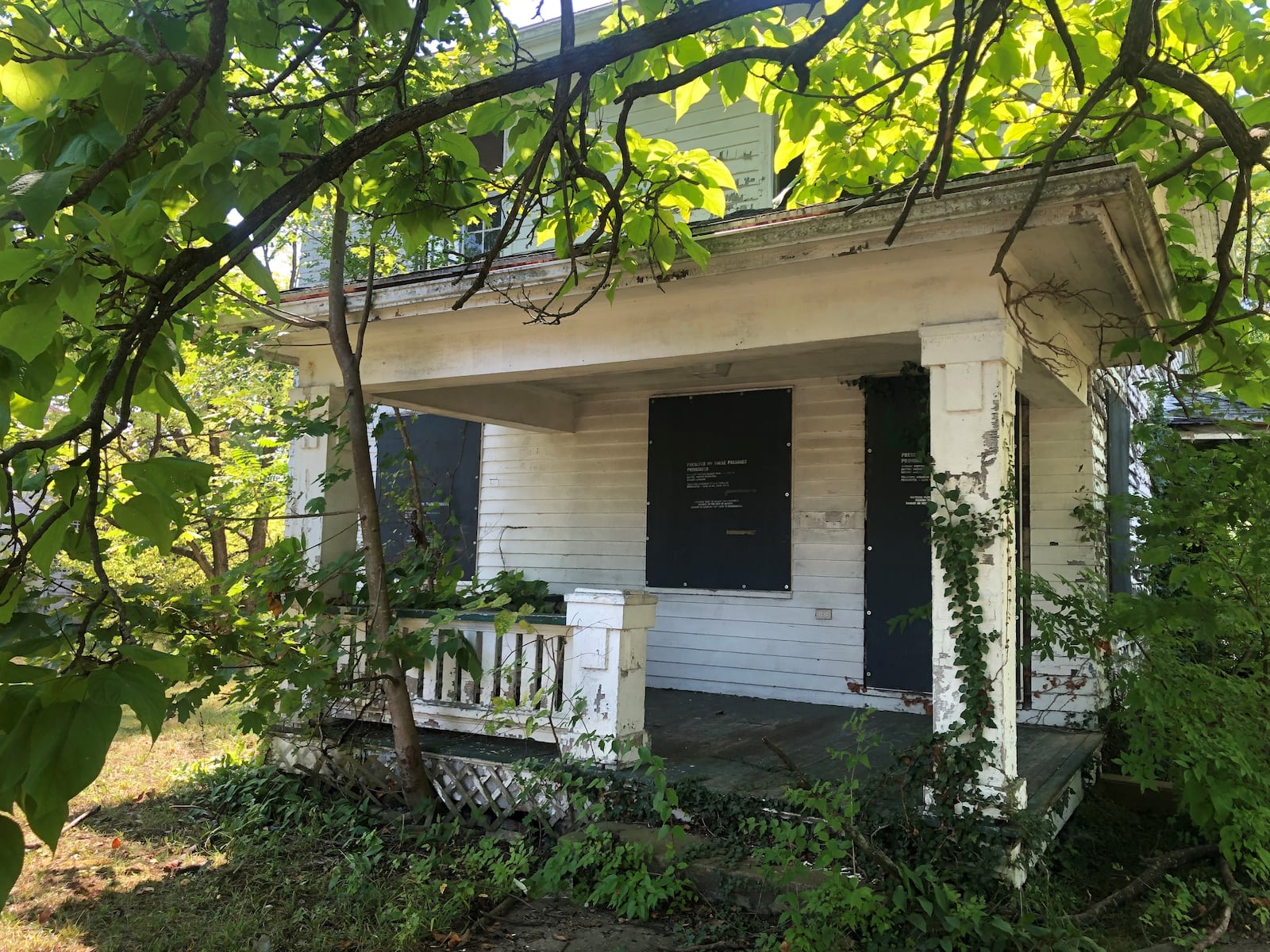 A blighted home on the 600 block of Oxford Avenue that neighbors said attracted illegal dumping. CORNELIUS FROLIK / STAFF