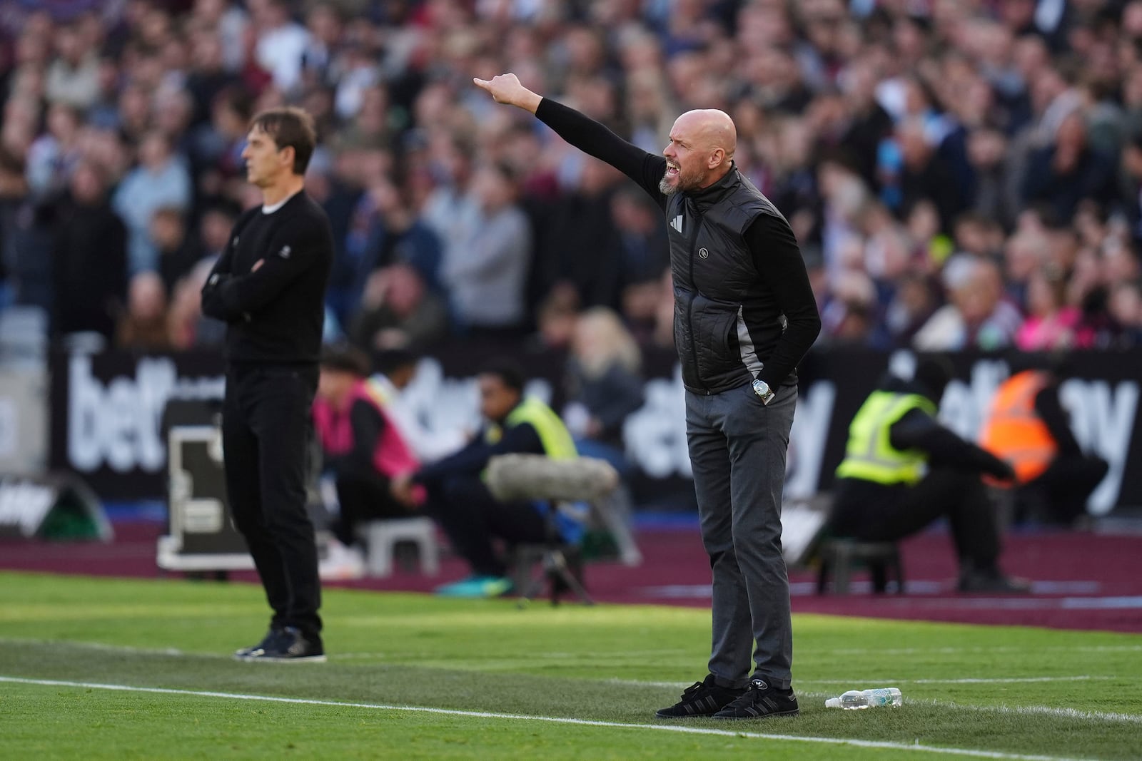 FILE - Manchester United manager Erik ten Hag gestures during the English Premier League soccer match between West Ham United and Manchester United at the London Stadium in London, Sunday, Oct. 27, 2024. (John Walton/PA via AP, File)