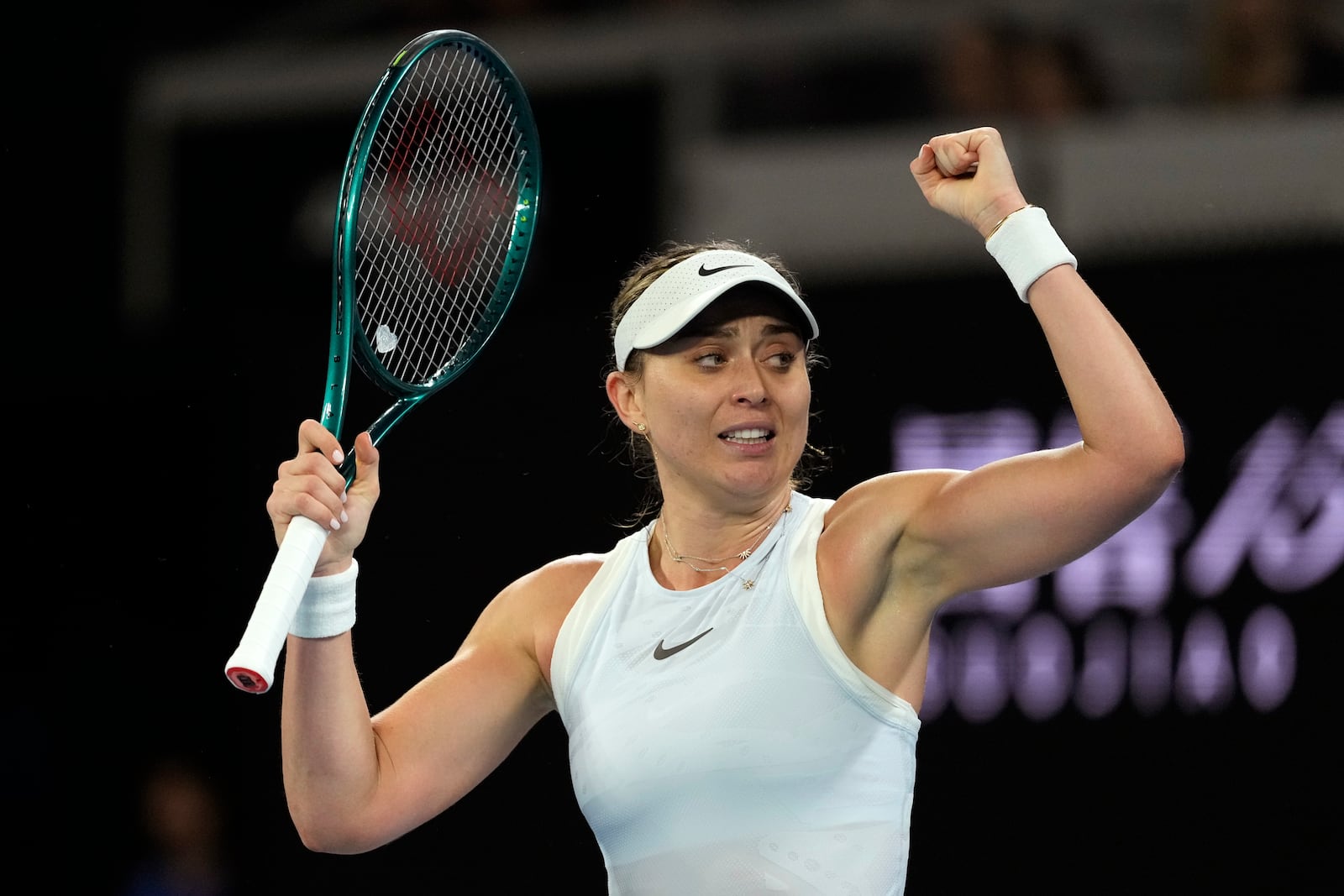 Paula Badosa of Spain celebrates after defeating Wang Xinyu of China in their first round match at the Australian Open tennis championship in Melbourne, Australia, Sunday, Jan. 12, 2025. (AP Photo/Ng Han Guan)