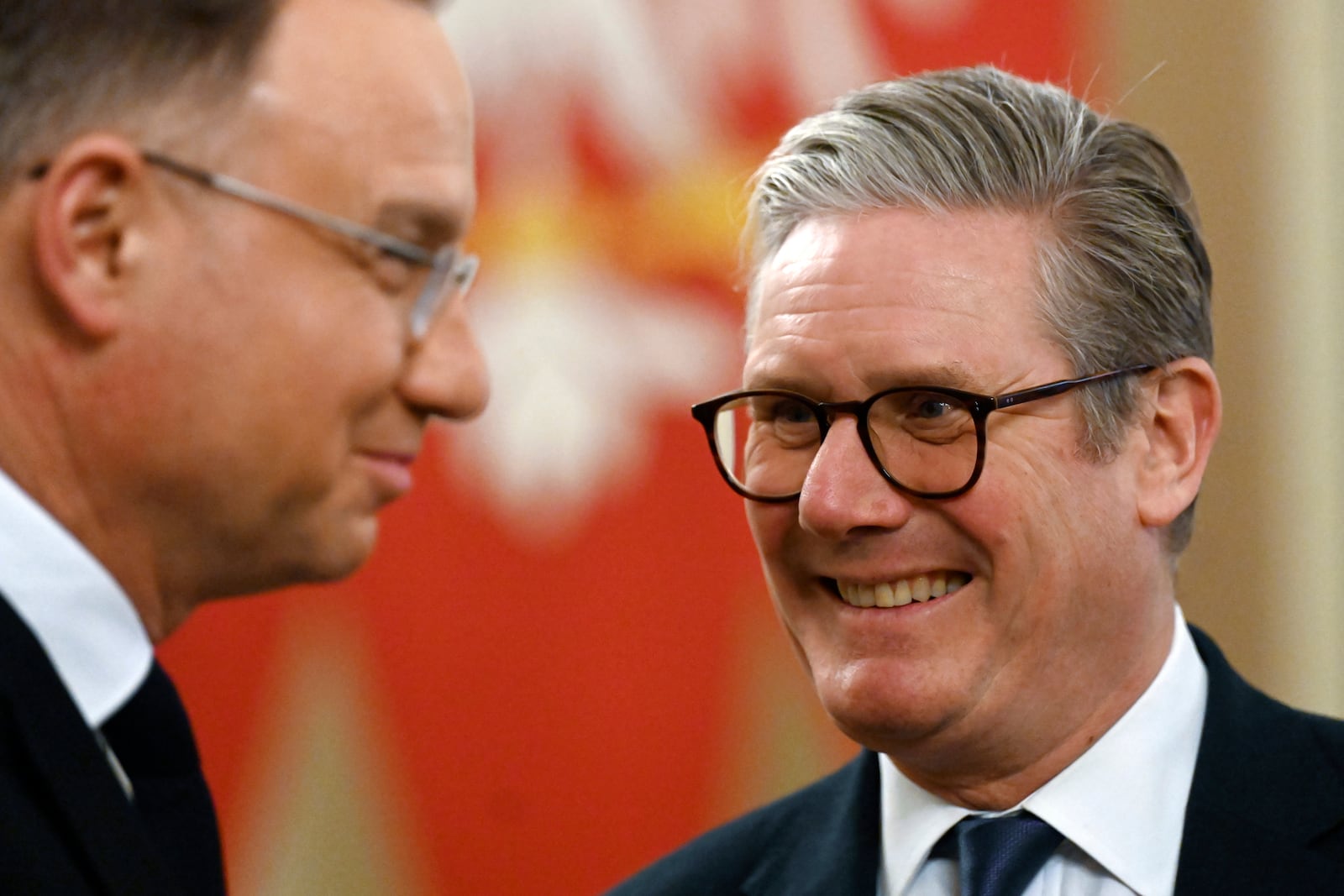 Poland's President Andrzej Duda welcomes Britain's Prime Minister Keir Starmer in Warsaw, Poland, Friday Jan. 17, 2025. (Sergei Gapon/Pool via AP)