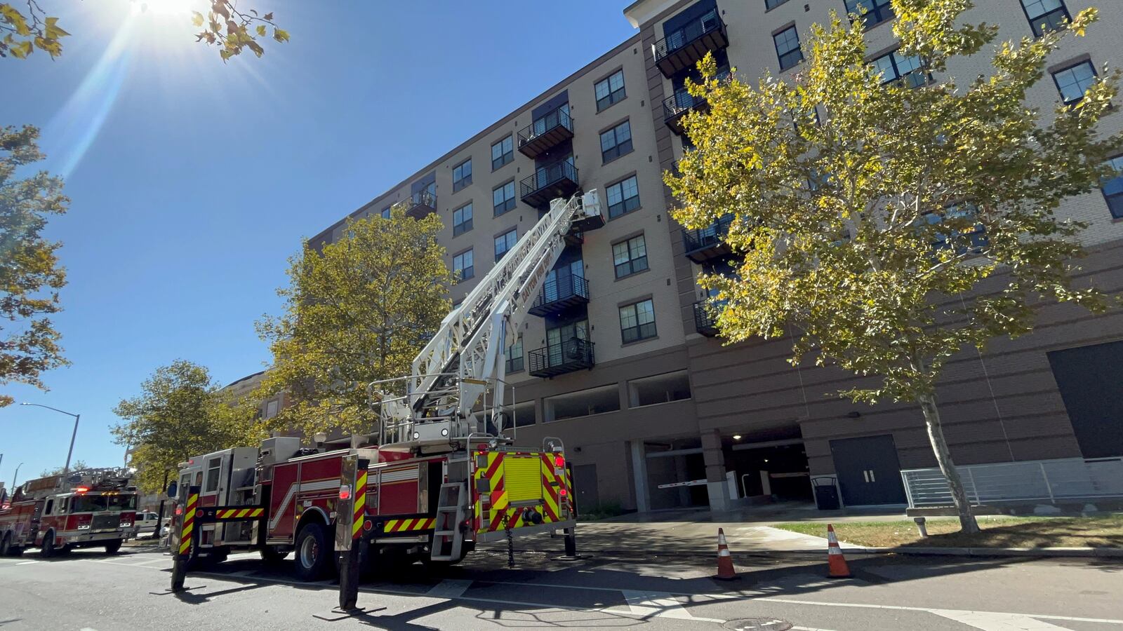 A fire broke out at the Monument apartments across from RiverScape in downtown Dayton at about 12:50 p.m. on Oct. 10, 2023. CORNELIUS FROLIK / STAFF