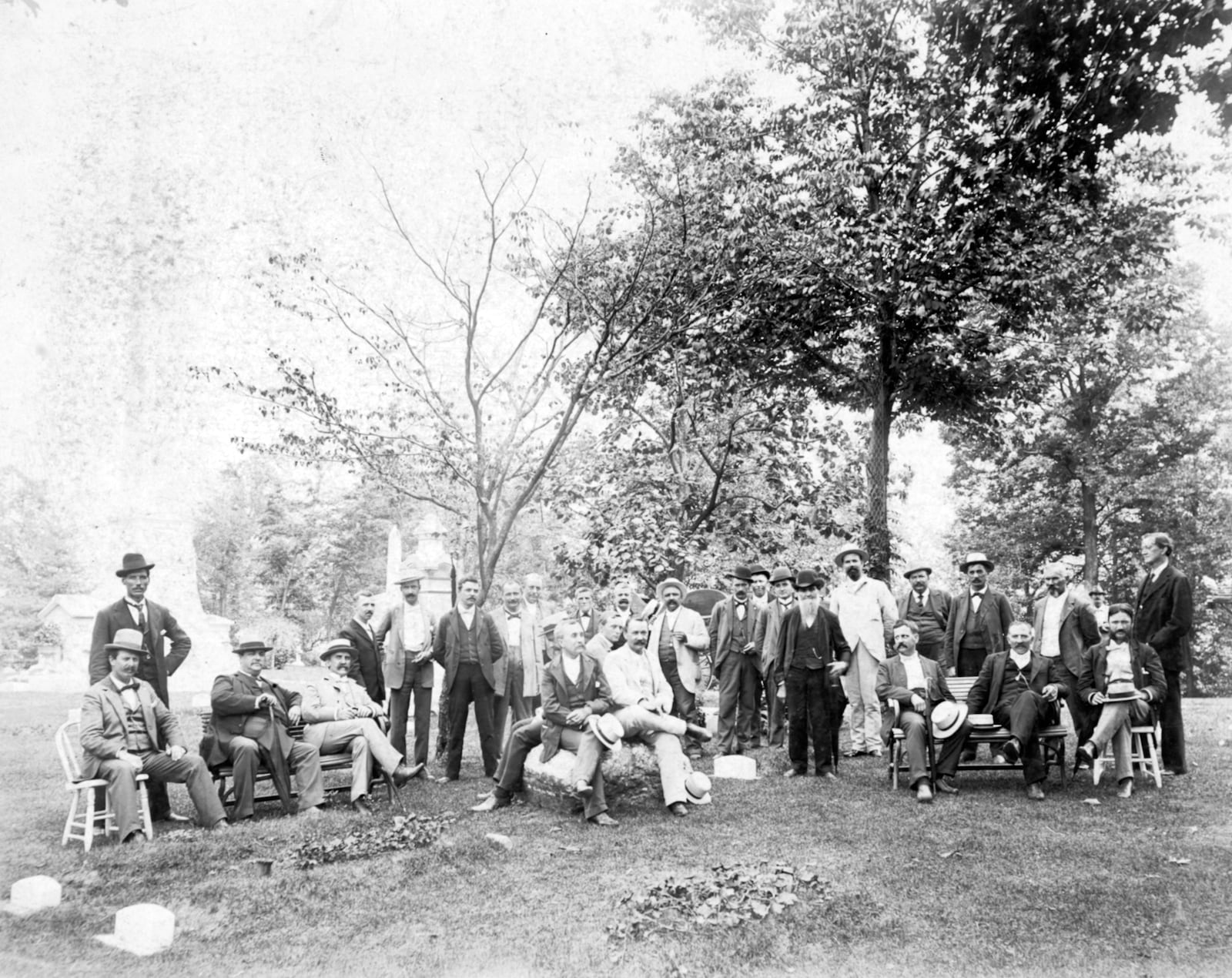 A group of men photographed in Woodland Cemetery in 1890. Family gatherings and picnics were popular in large park-like cemeteries. WRIGHT STATE UNIVERSITY SPECIAL COLLECTIONS AND ARCHIVE