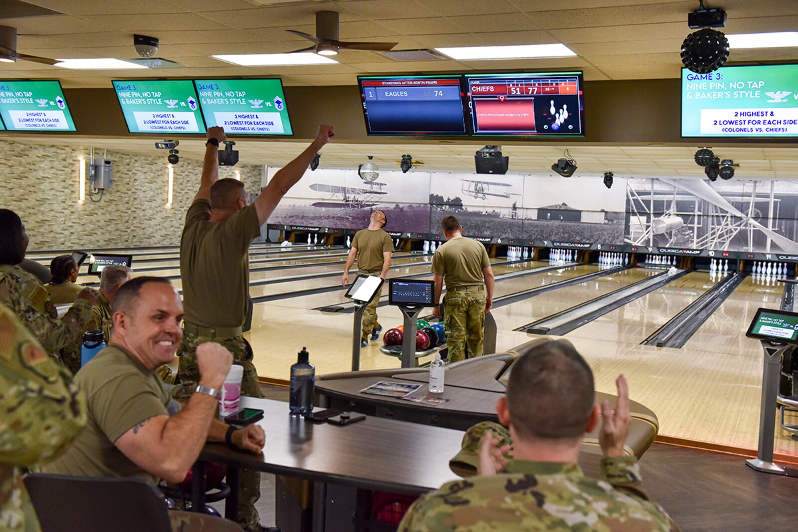 Chief master sergeants of the 88th Air Base Wing celebrate their win in the Eagles vs. Chiefs Bowling Challenge at Wright-Patterson Air Force Base on April 11. U.S. AIR FORCE PHOTO/SENIOR AIRMAN JACK GARDNER