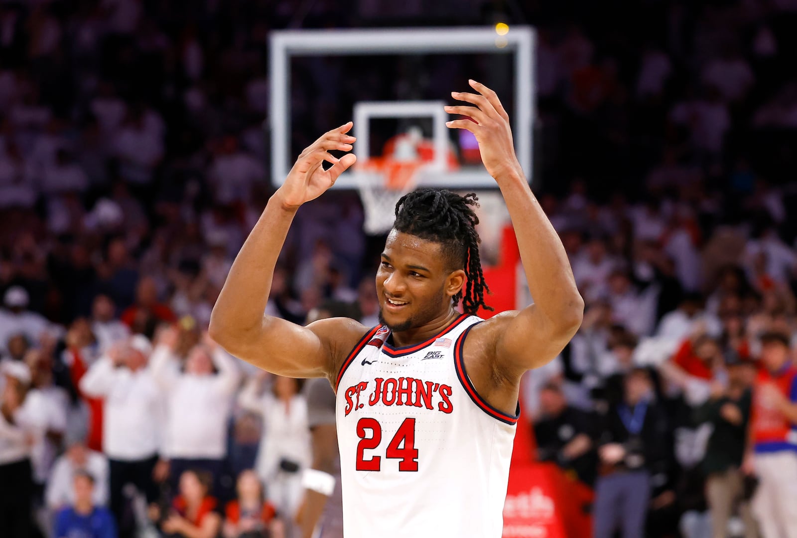 St. John's Zuby Ejiofor (24) reacts after defeating Seton Hall in an NCAA college basketball game, Saturday, March 1, 2025, in New York. (AP Photo/Noah K. Murray)