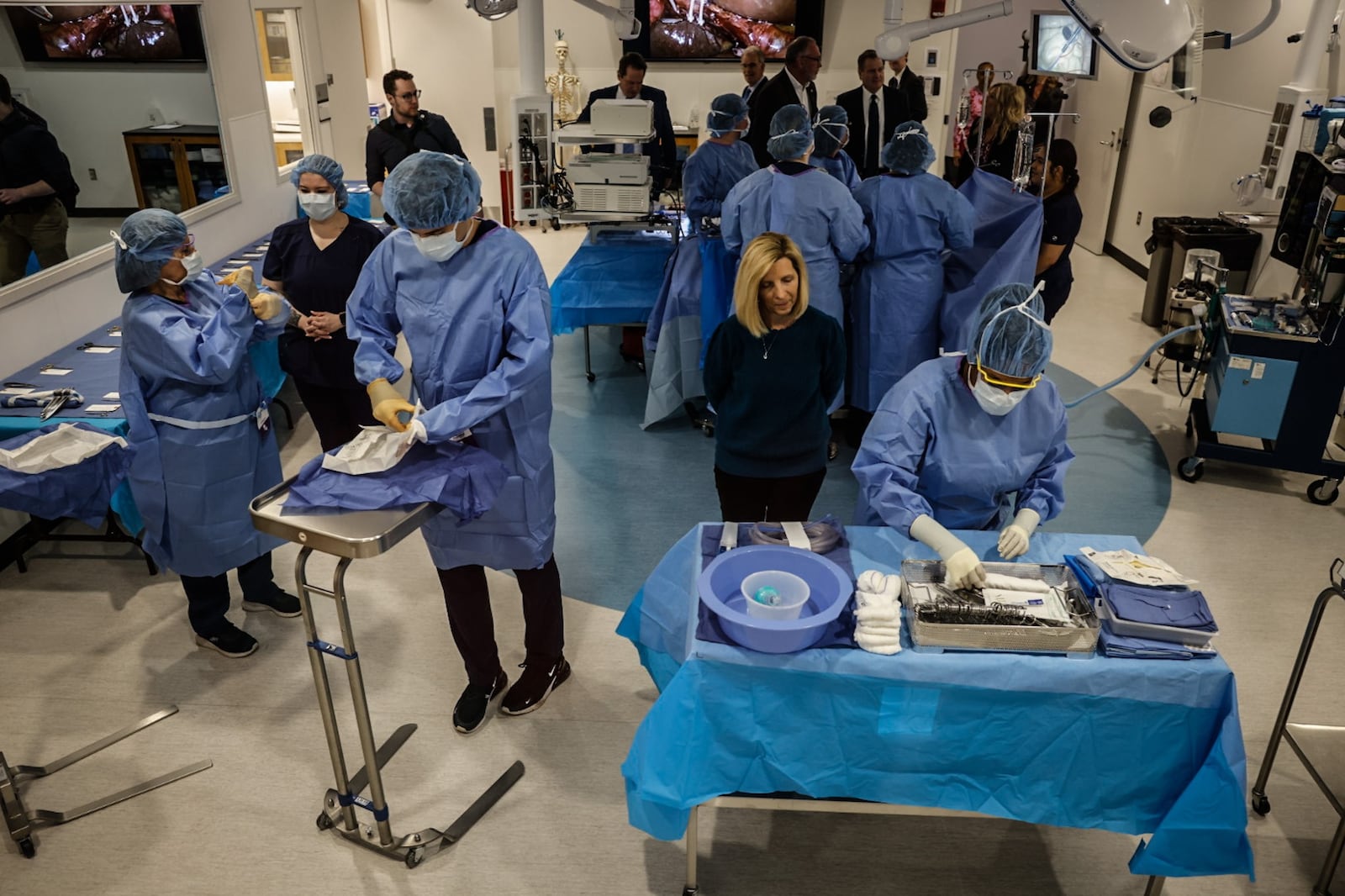 Sinclair College students work in the surgical technician simulator at the health sciences center Tuesday April 2, 2024. Sinclair secured $2 million in federal funding to certify more programs and renovate several labs at the Dayton campus. JIM NOELKER/STAFF