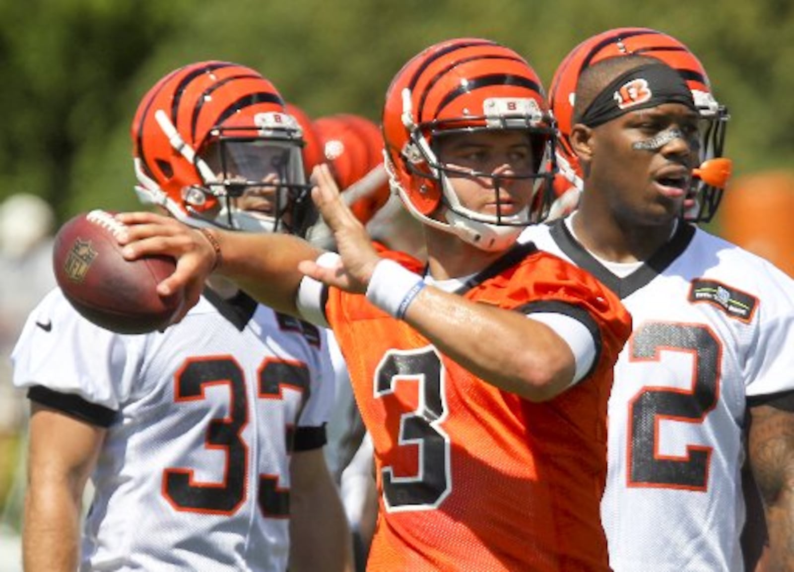 Bengals quarterback Keith Wenning (3) makes a throw during the opening day of Bengals training camp, Friday, July 31, 2015. GREG LYNCH / STAFF