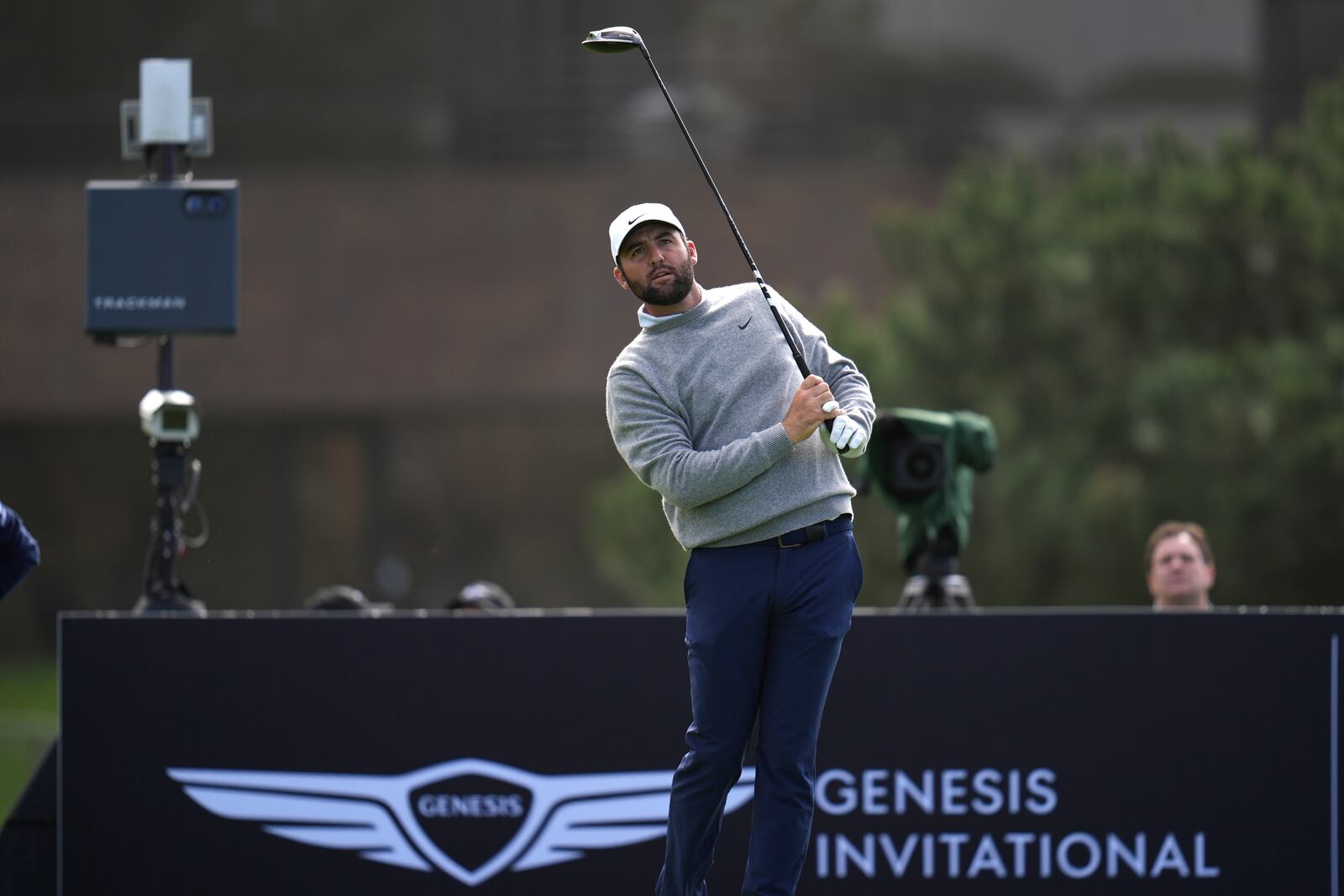 Scottie Scheffler hits a tee shot on the 14th hole of the South Course at Torrey Pines during the second round of the Genesis Invitational golf tournament Friday, Feb. 14, 2025, in San Diego. (AP Photo/Gregory Bull)