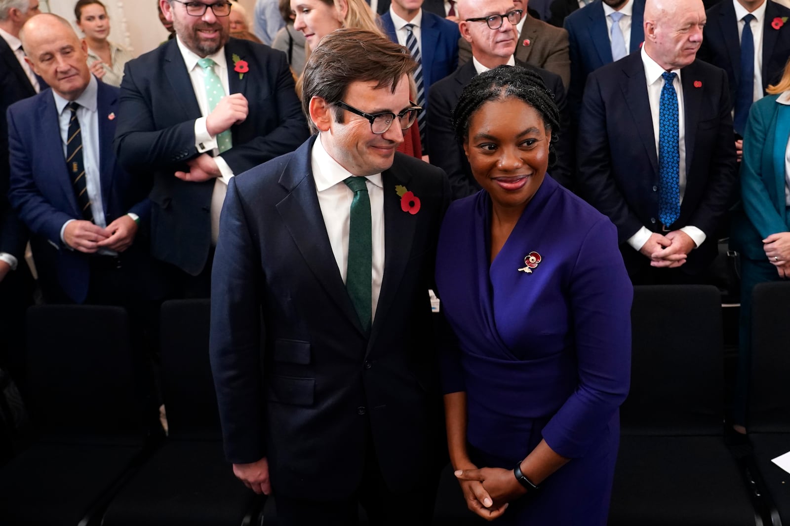 Britain's Member of Parliament Kemi Badenoch, right, poses with her husband Hamish Badenoch for the cameras after being elected as the new leader of the opposition Conservative Party, in London, Saturday, Nov. 2, 2024. (AP Photo/Alberto Pezzali)