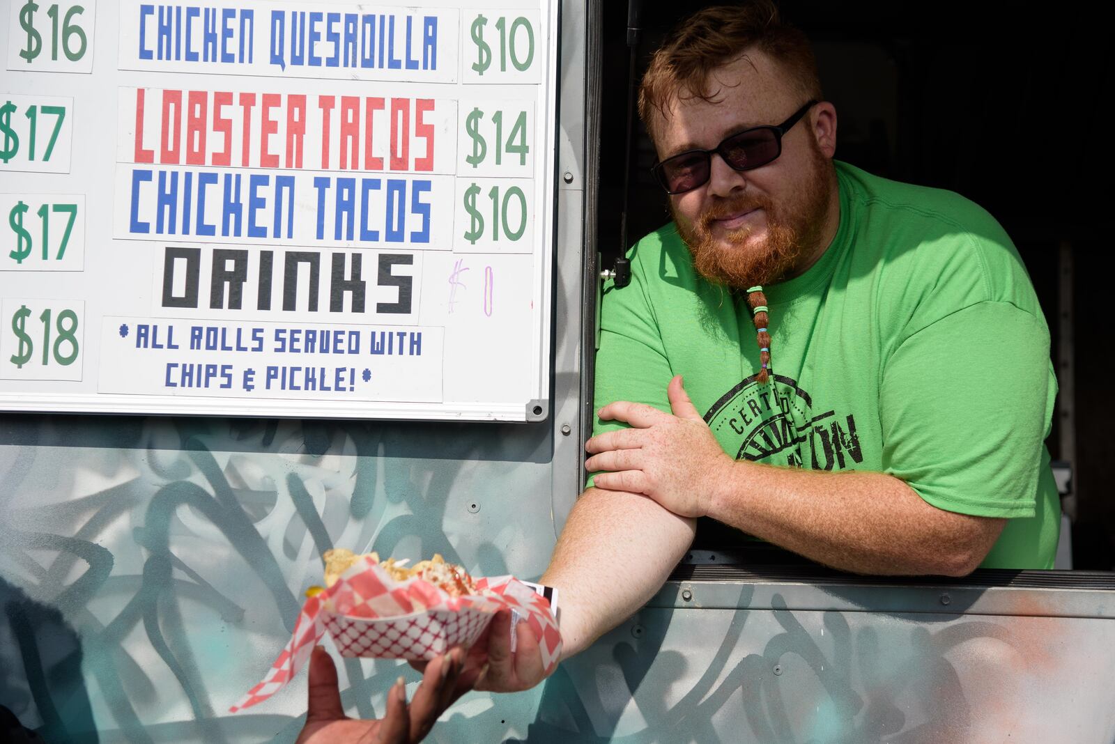 The Yellow Cab hosted another one of its monthly food truck rallies on Friday, July 19. Street food, live music and shopping at The Night Market are part of the fun. This month the trucks that attended were El Meson, Smokinbeebeeq, Greek Street Food Truck, The Wicked Lobstah, EAT, Cupzilla-Korean BBQ, Thai1On, Bella Sorella Pizza, Cheezy Creationz
and Billie Gold Bubble Tea. TOM GILLIAM / CONTRIBUTING PHOTOGRAPHER