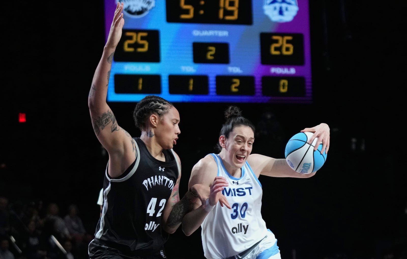 FILE - Mist forward Breanna Stewart (30) drives tot the basket as Phantom center Brittney Griner (42) defends during the first half of an Unrivaled 3-on-3 basketball game Friday, Jan. 24, 2025, in Medley, Fla. (AP Photo/Lynne Sladky, File)