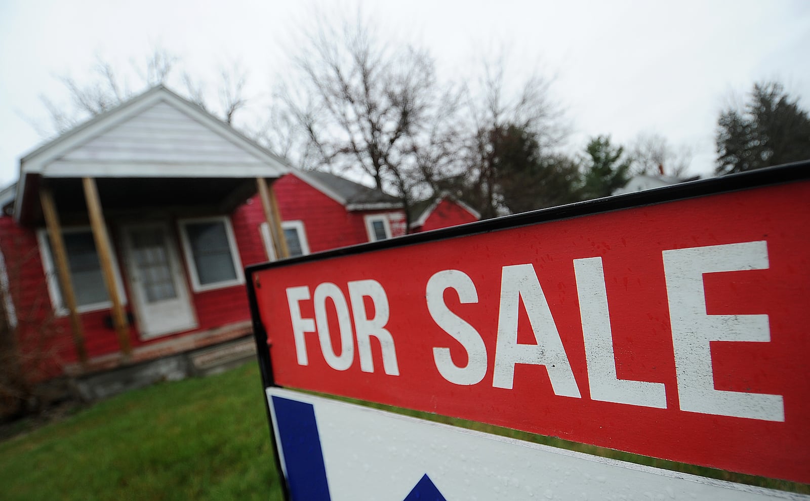 Sales of single-family homes in the Dayton area saw an 8% drop in February 2023 compared to a year ago. February was the sixth consecutive month of decreases in year-over year sales, but prices continued to rise. Pictured is a home for sale on Woodman Drive in Riverside. MARSHALL GORBY/STAFF