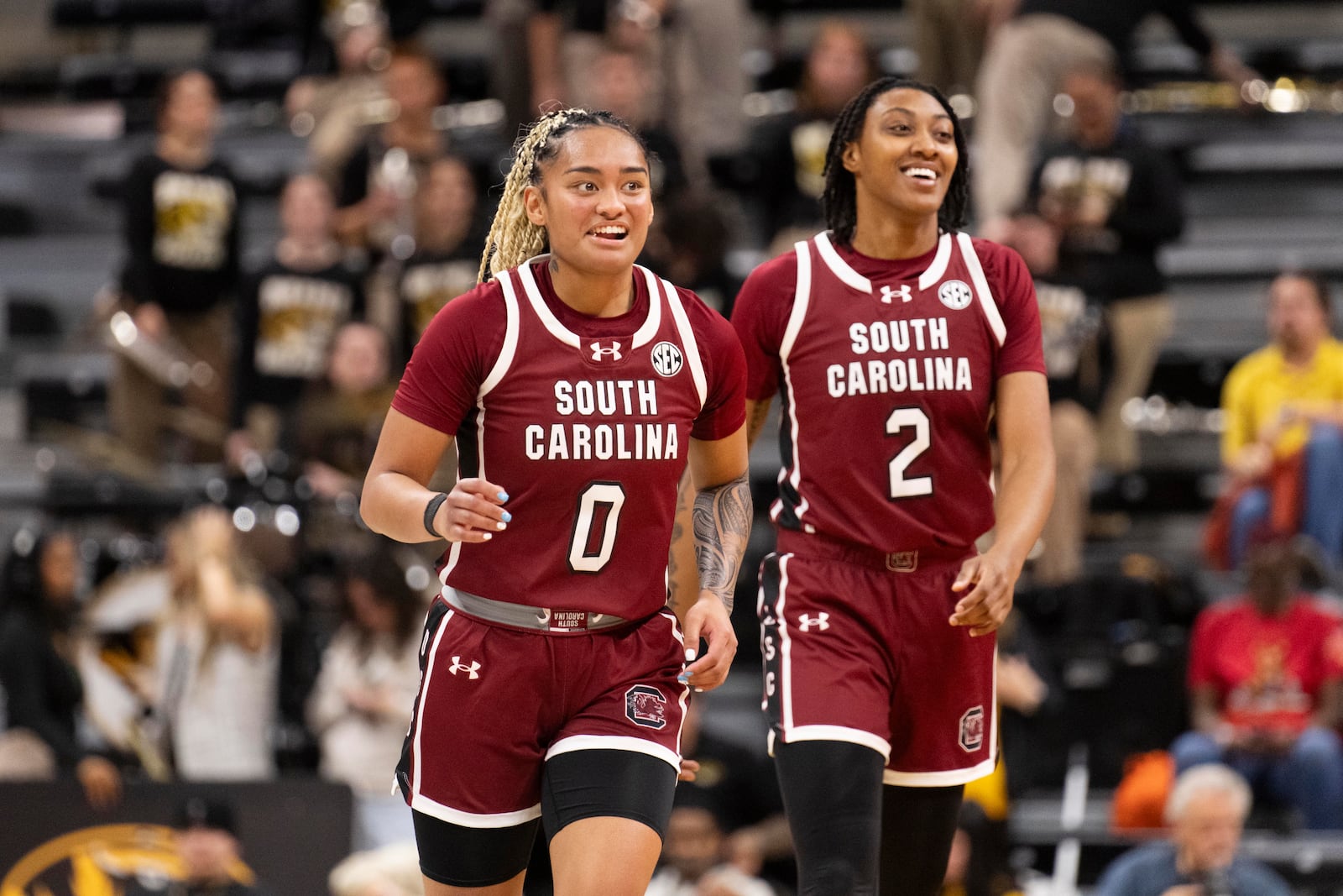 South Carolina's Te-Hina Paopao (0) laughs with teammate Ashlyn Watkins (2) as they walk off the court during the second half of an NCAA college basketball game against Missouri, Thursday, Jan. 2, 2025, in Columbia, Mo. South Carolina won 83-52. (AP Photo/L.G. Patterson)