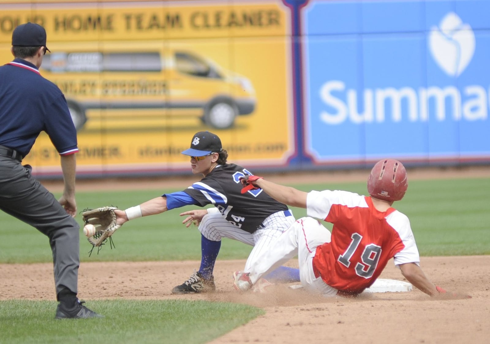 Springboro shortstop Ben Barger couldn’t prevent Noah Gladish of Mentor from stealing second base in what started a three-run fifth inning. Mentor defeated Springboro 4-0 in a D-I baseball state semifinal at Akron’s Canal Park on Friday, June 7, 2019. MARC PENDLETON / STAFF