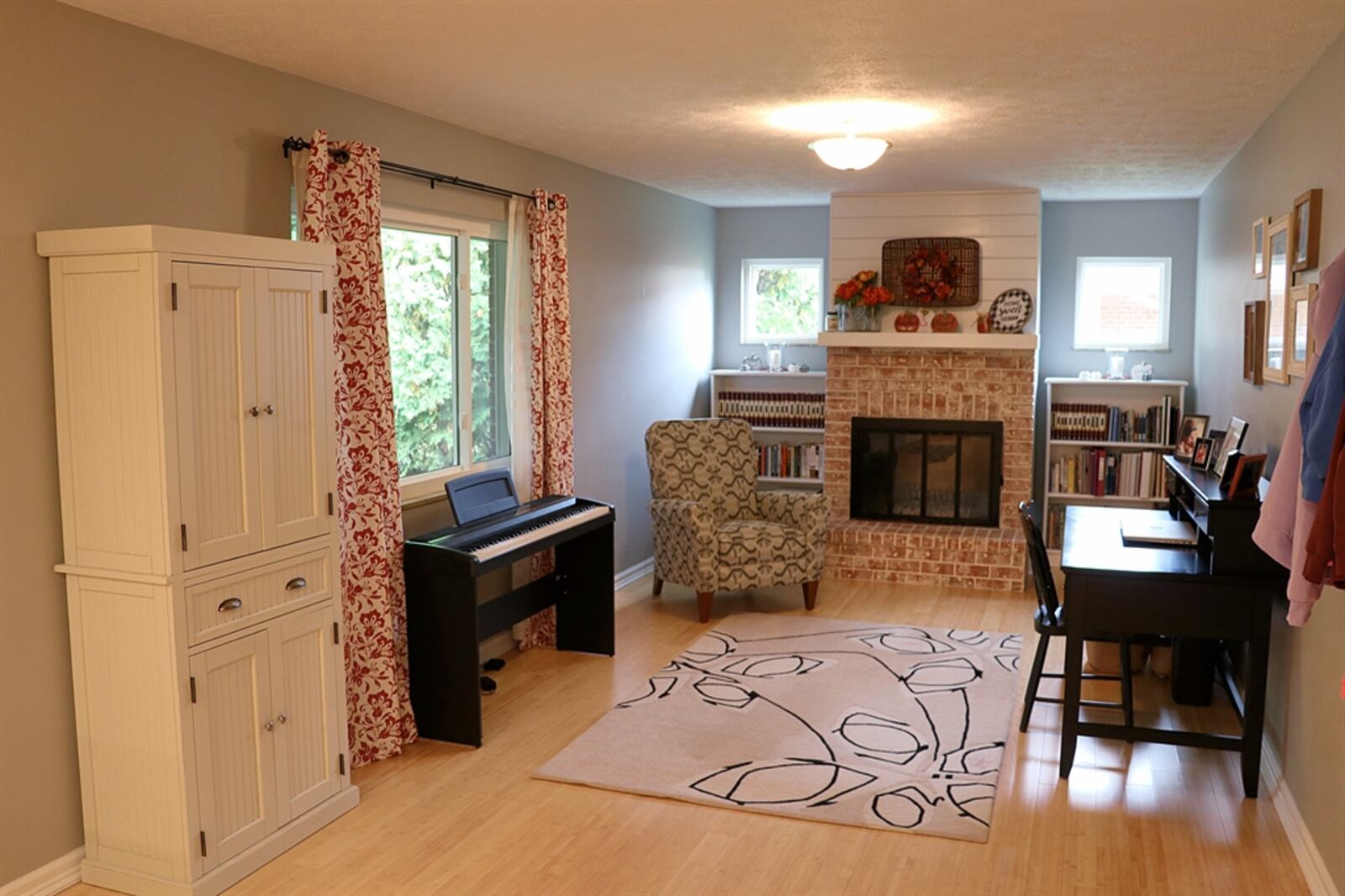 The family room features a fireplace. KATHY TYLER/CONTRIBUTOR