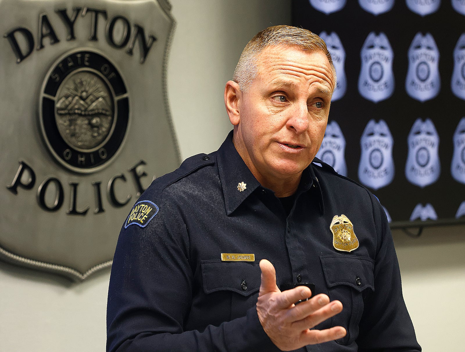 Dayton Police Maj. Brian Johns speaks during a press conference Tuesday, Feb. 11, 2025, at the Safety Building to talk about the fatal shooting early Monday morning on Millicent Avenue. MARSHALL GORBY/STAFF