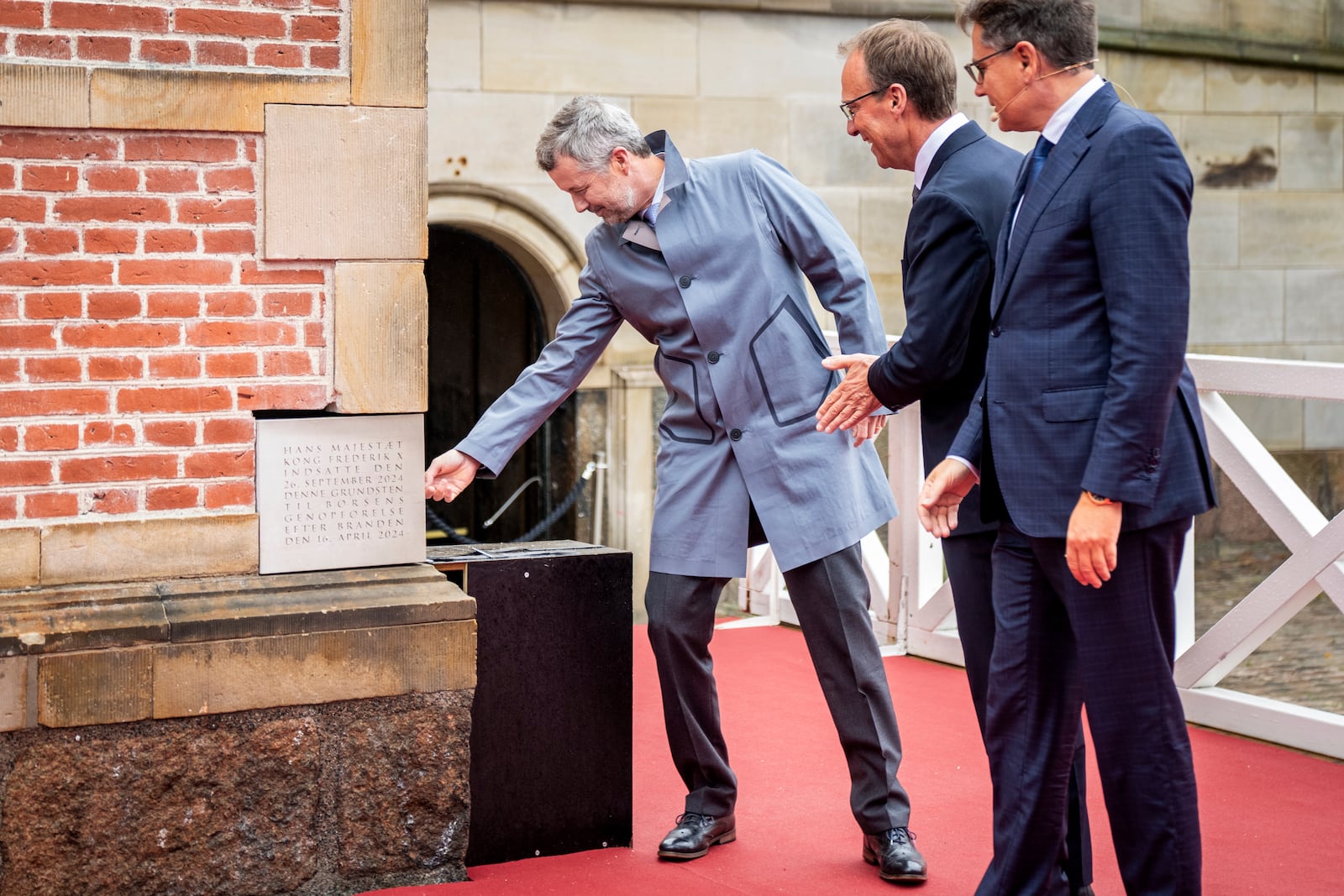 Denmark's King Frederik X lays the foundation stone for the reconstruction of the Stock Exchange in Copenhagen, Thursday, Sept. 26, 2024. (Ida Marie Odgaard/Ritzau Scanpix via AP)