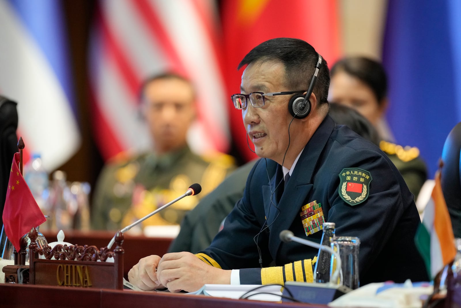 Chinese Defense Minister Dong Jun speaks during the Association of Southeast Asian Nations (ASEAN) defense ministers' meeting in Vientiane, Laos, Thursday, Nov. 21, 2024. (AP Photo/Anupam Nath)