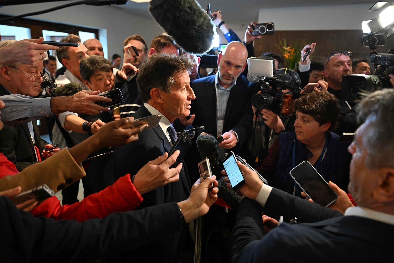 Unsuccessful candidate Sebastian Coe speaks to the media after he failed in his bid to become the new IOC President at the International Olympic Committee 144th session in Costa Navarino, western Greece, Thursday, March 20, 2025. (AP Photo/Nikolas Kominis)