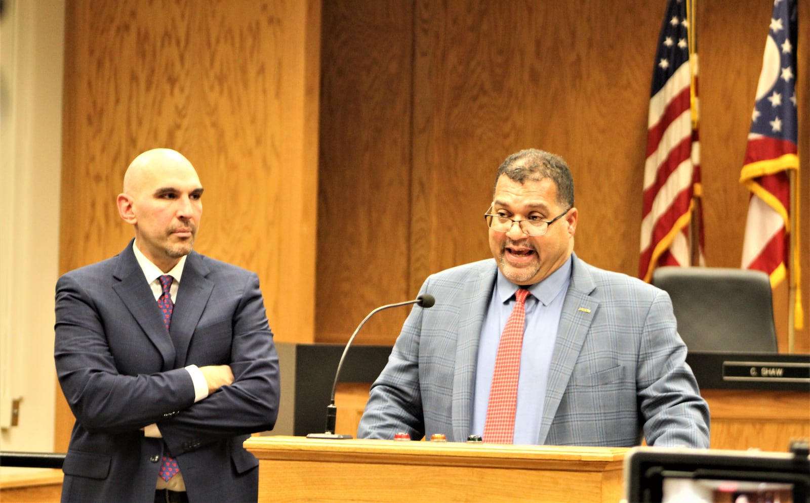 Dayton City Commissioners Chris Shaw and Matt Joseph speak on Thursday about a potential government shutdown if a budget is not approved. CORNELIUS FROLIK / STAFF