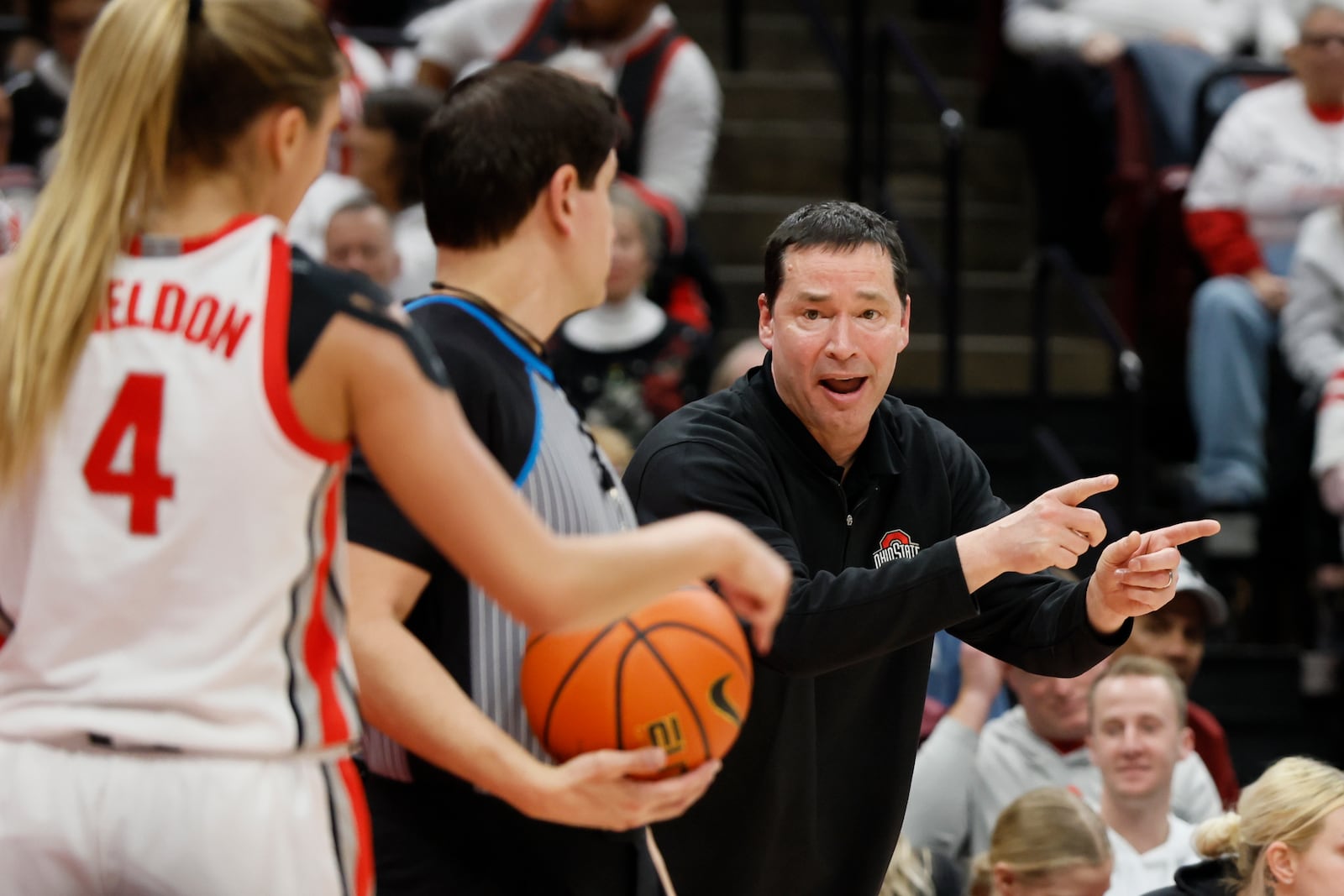 Ohio State head coach Kevin McGuff questions the referee's call during the second half of an NCAA college basketball game against UCLA Monday, Dec. 18, 2023, in Columbus, Ohio. (AP Photo/Jay LaPrete)