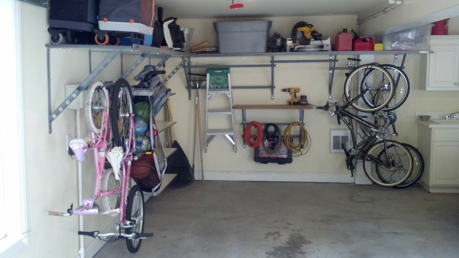 A After: The "after" shot of Atlanta garage, which used Garage Solutions Atlanta to plan out and install racks and shelving to de-clutter the space. Credit: Garage Solutions Atlanta. Provided photo