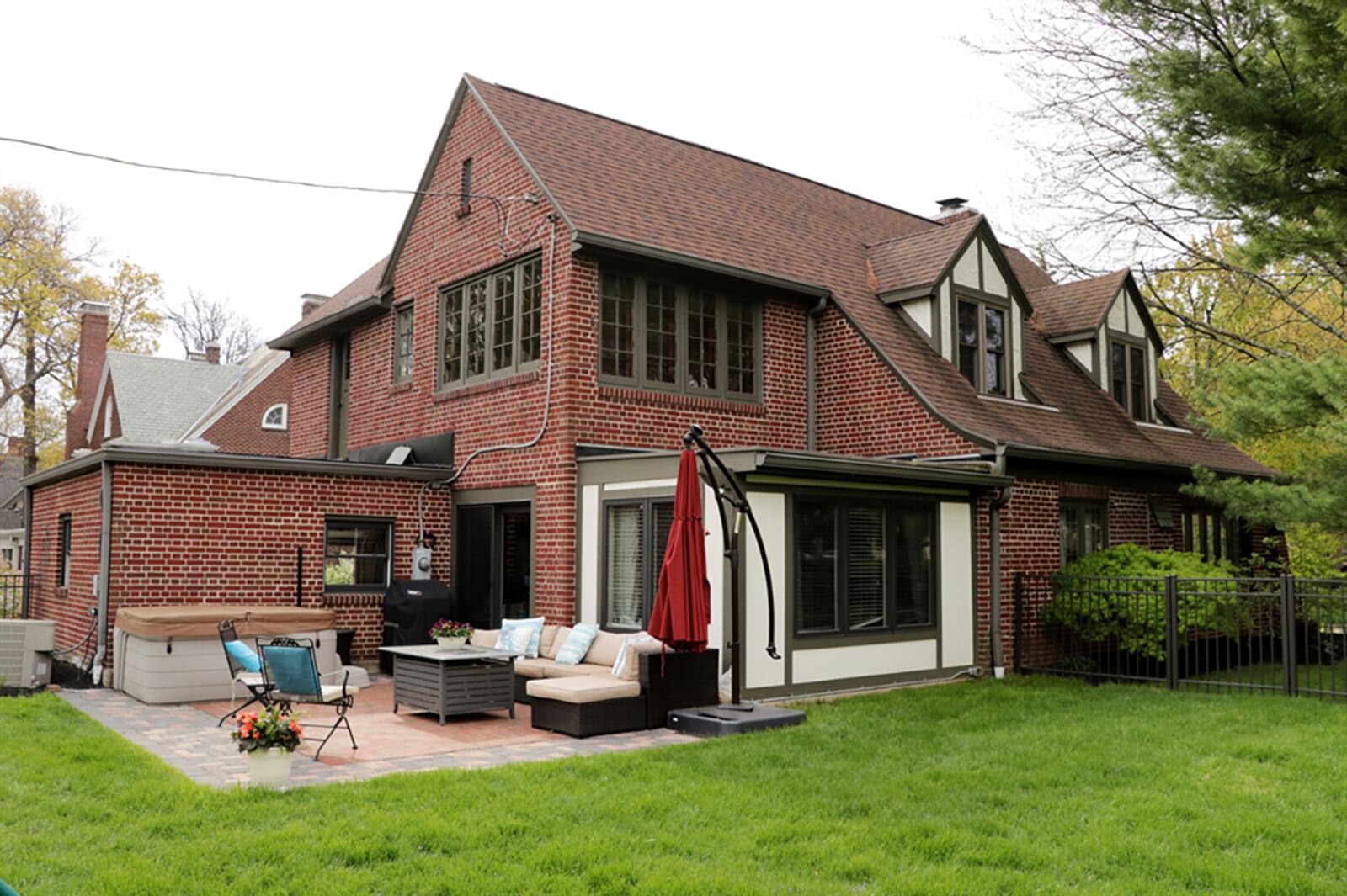 The family room was once a sun patio but was redesigned into a bright family room with patio doors that open out to an extended paver-brick patio and fenced back yard. The home includes a 2-car garage. CONTRIBUTED PHOTO BY KATHY TYLER