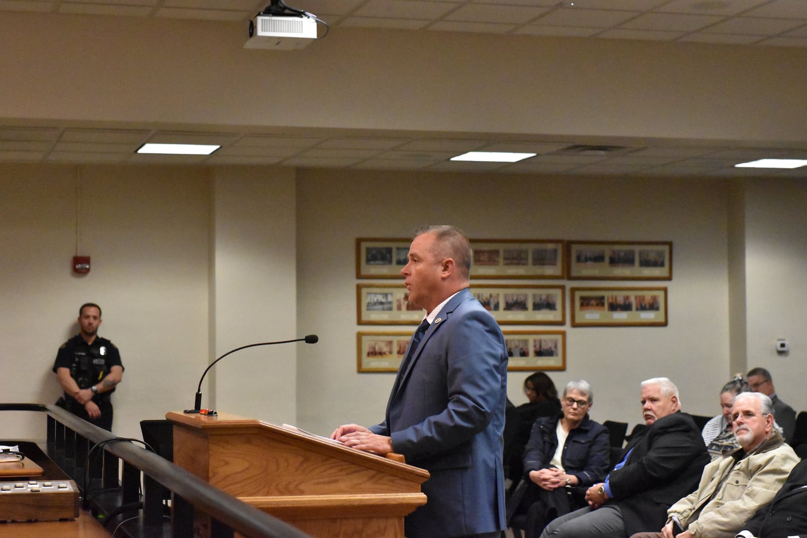 Kraig Robinson, president of the Dayton International Association of Fire Fighters Local 136, speaks at a city commission meeting on Dec. 7, 2023. CORNELIUS FROLIK / STAFF