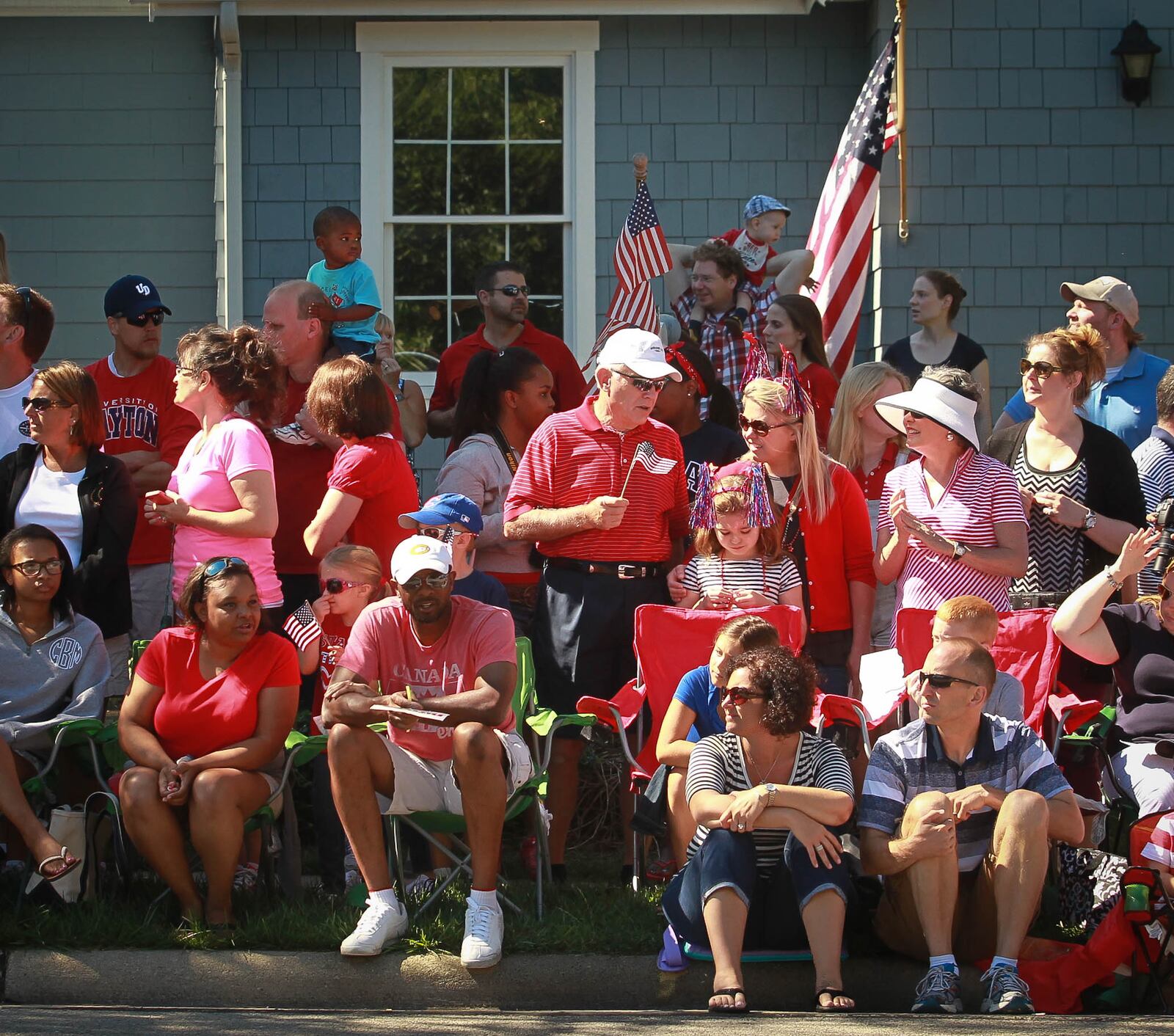 Spectators along the Franklin Street route of Centerville's Americana parade Friday, one of the area's largest annual Independence Day festival events. JIM WITMER / STAFF