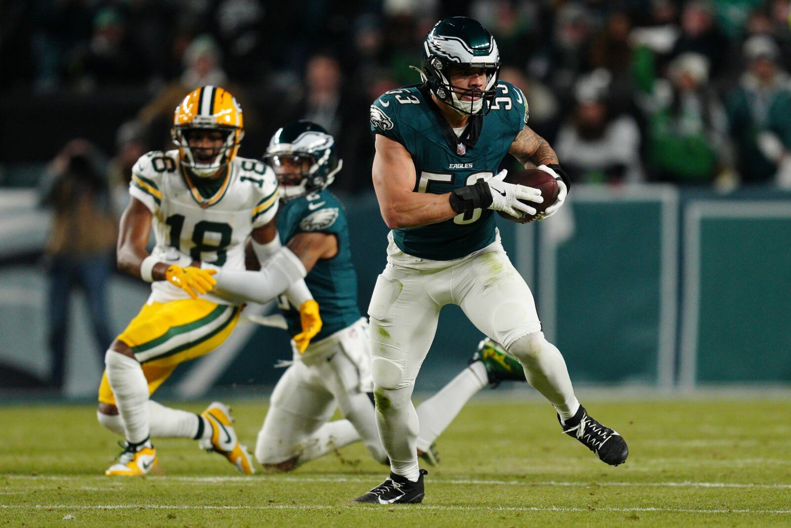 Philadelphia Eagles linebacker Zack Baun (53) runs with the ball after making an interception during the first half of an NFL wild-card playoff football game against the Green Bay Packers on Sunday, Jan. 12, 2025, in Philadelphia. (AP Photo/Derik Hamilton)