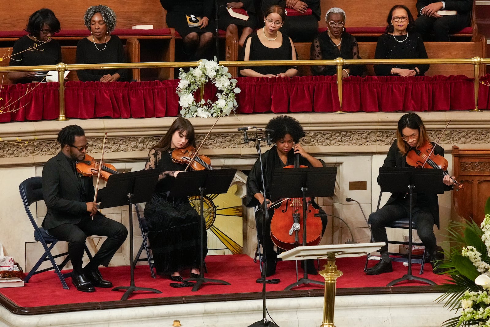 The Nebulous String Quartet performs during a ceremony in celebration of Roberta Flack's life at The Abyssinian Baptist Church on Monday, March 10, 2025, in New York. (AP Photo/Richard Drew)