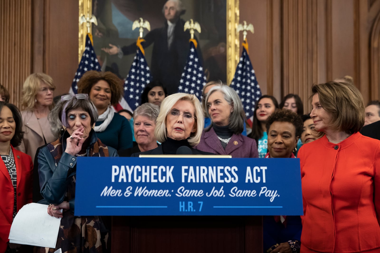 FILE - Lilly Ledbetter, center, an activist for workplace equality, is flanked by Speaker of the House Nancy Pelosi, D-Calif., right, and Rep. Rosa DeLauro, D-Conn., sponsor of the Paycheck Fairness Act, left, speaks at an event to advocate for the Paycheck Fairness Act at the Capitol in Washington, Jan. 30, 2019. (AP Photo/J. Scott Applewhite)