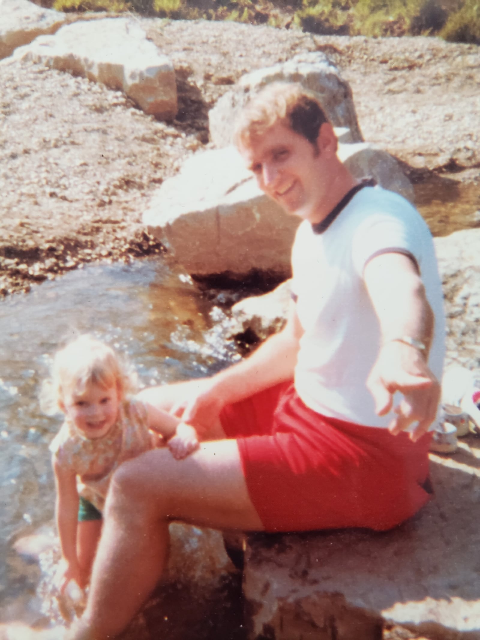 Jim Siewe, former Dayton Flyers football player and Hall of Famer at Chaminade Julienne abd Alter high schools, with his 2 ½ year old daughter Amy at Sugar Creek Reserve. “We were doing some creek walking and the water was clear and I was teaching her how to pick up crawdads,” Jim said. “But when she saw that first snake, her eyes just got so big and she was enamored with them from then on.” CONTRIBUTED