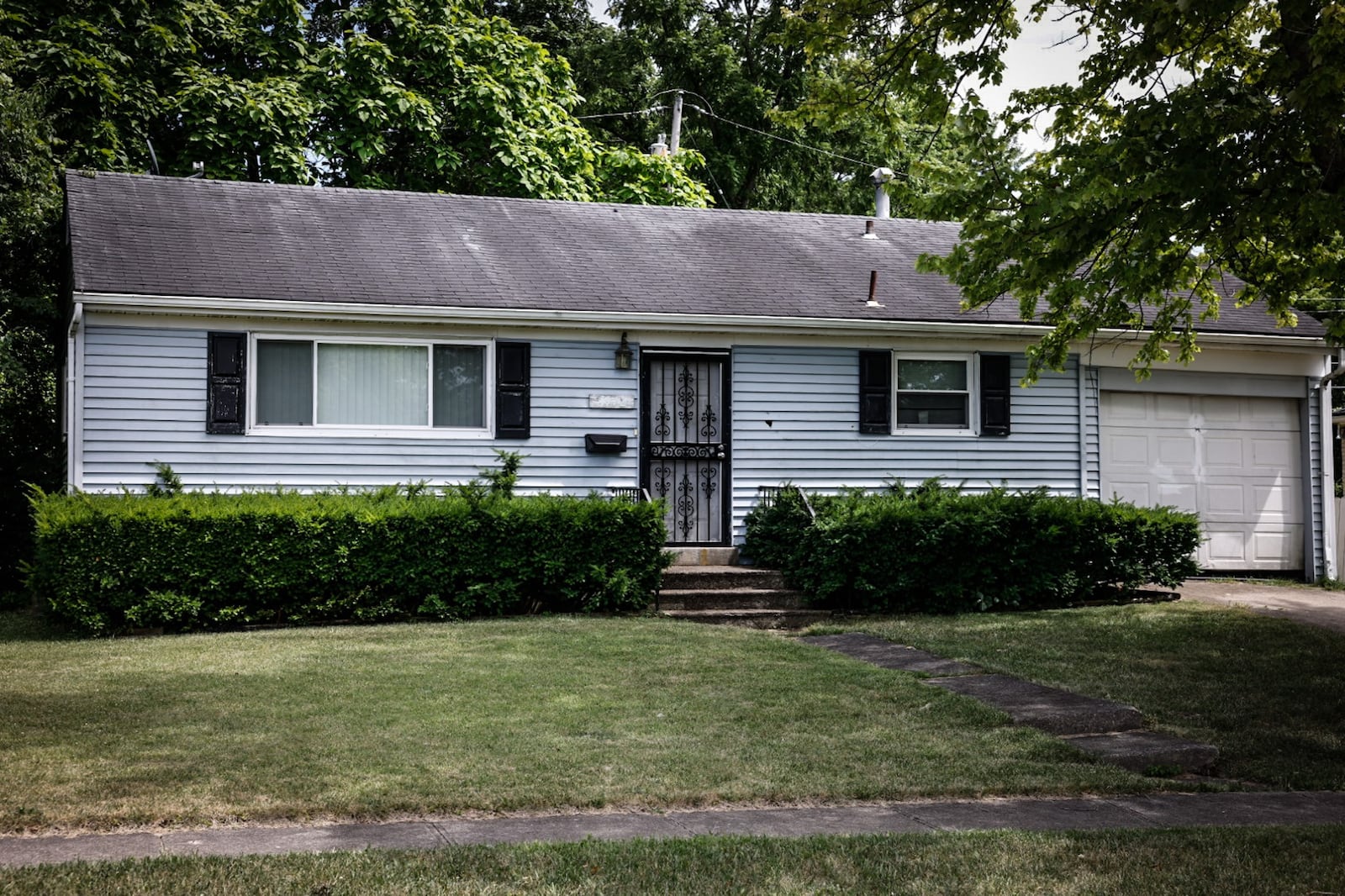 This house on Hackett Drive is at the center of a quitclaim deed fraud in Montgomery County. JIM NOELKER/STAFF